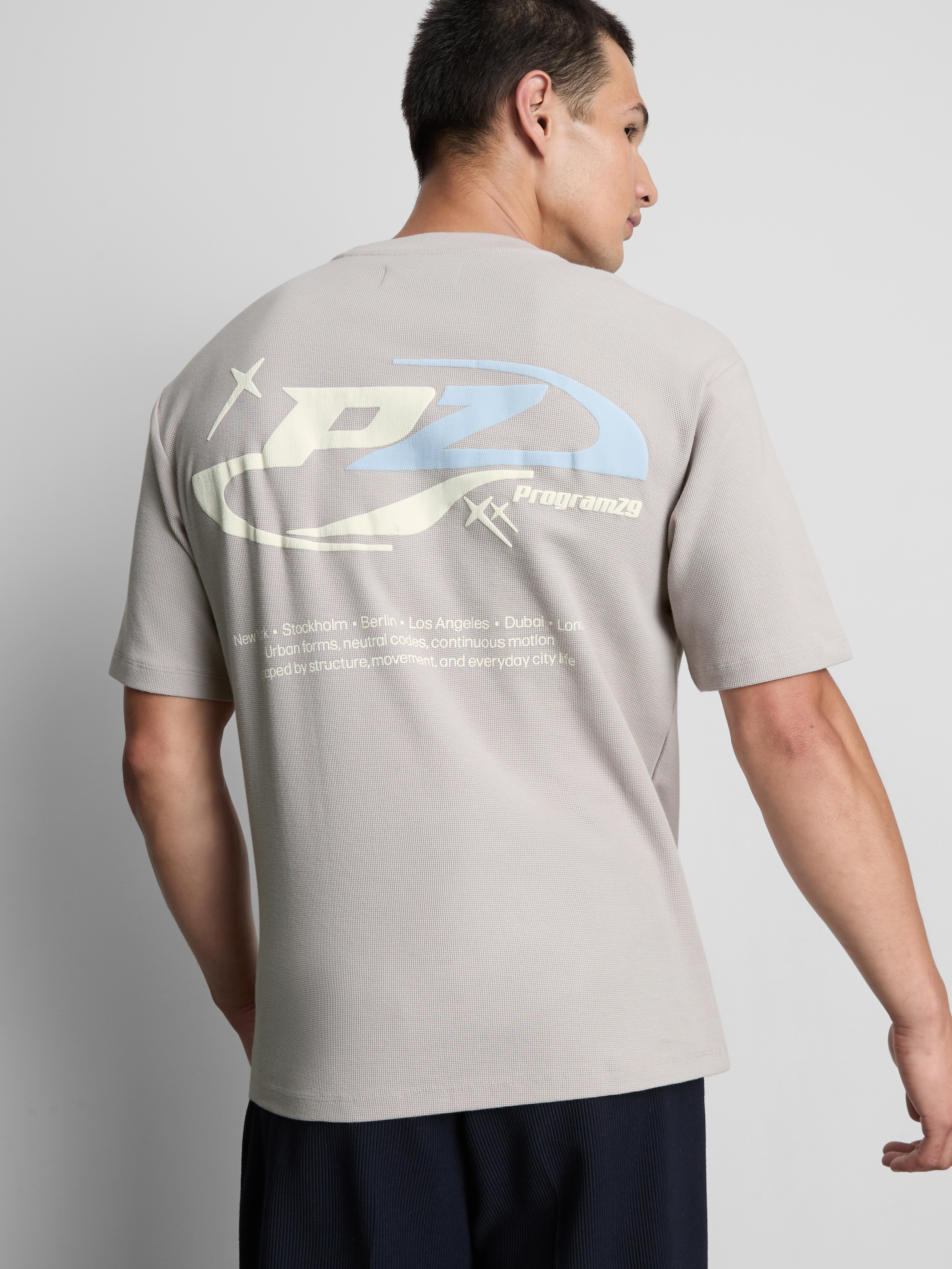 T-shirt texturada gráfico logótipo