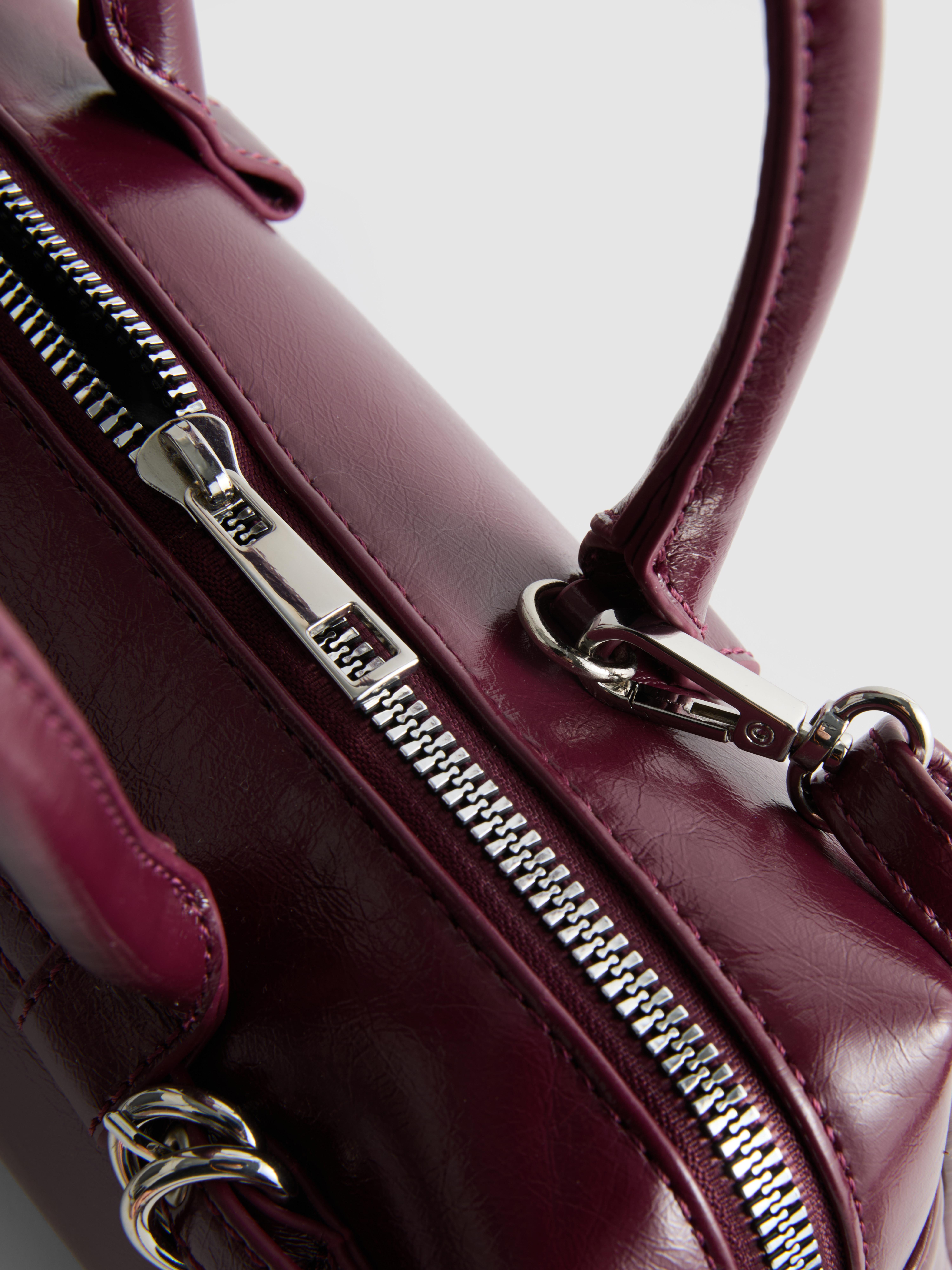 Schultertasche mit Ösen