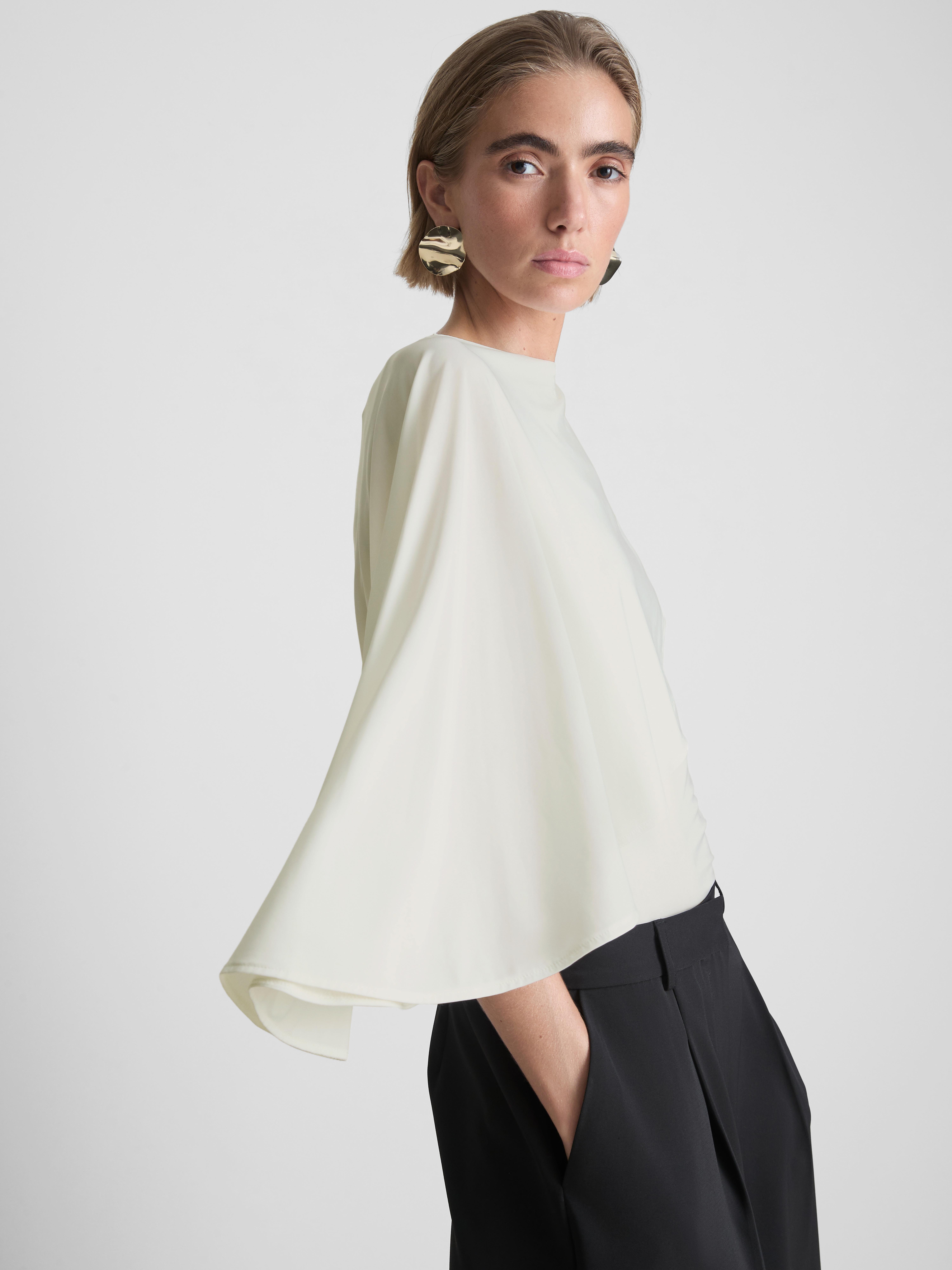 Asymmetric Cape Top