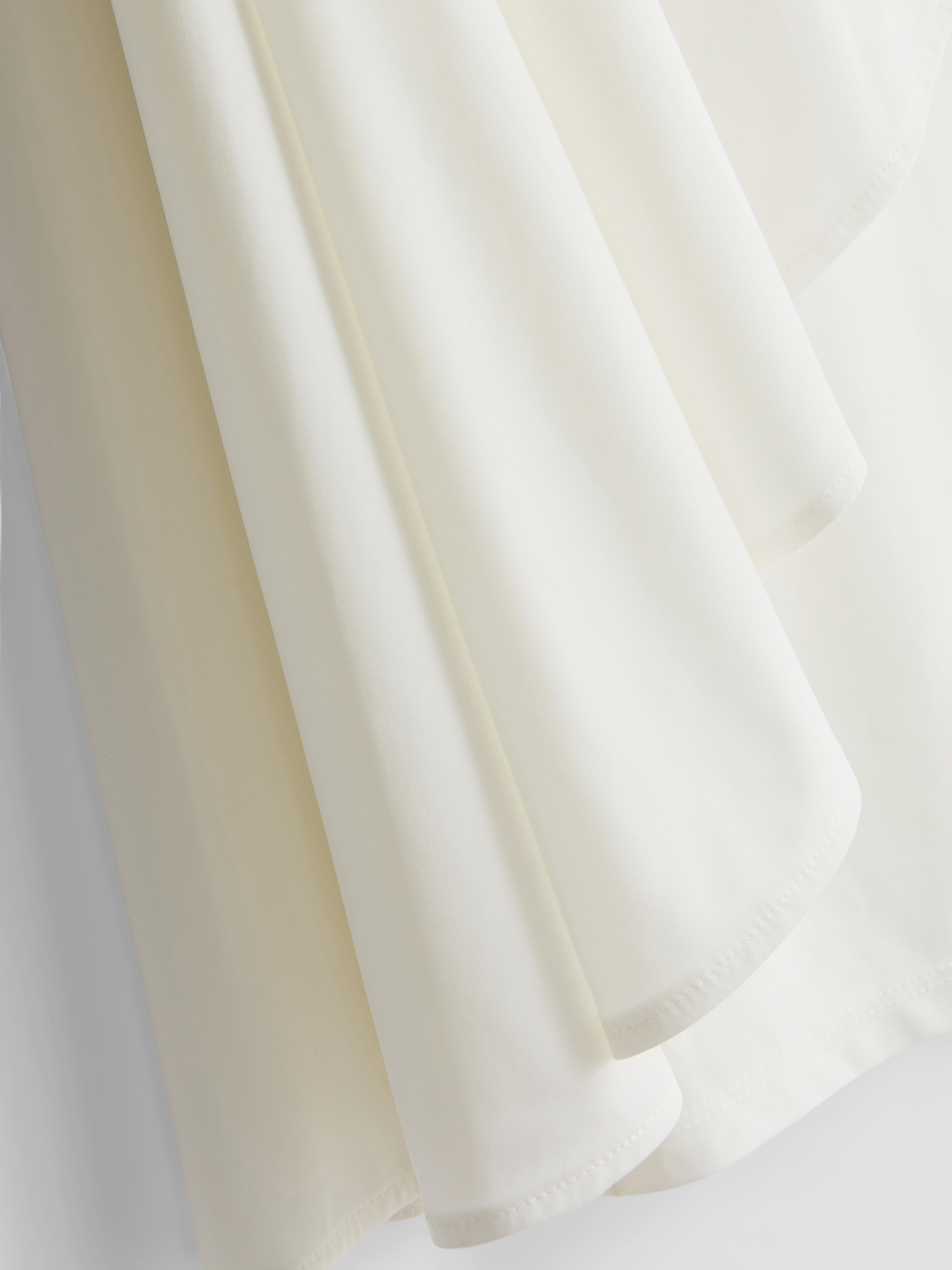 Asymmetric Cape Top