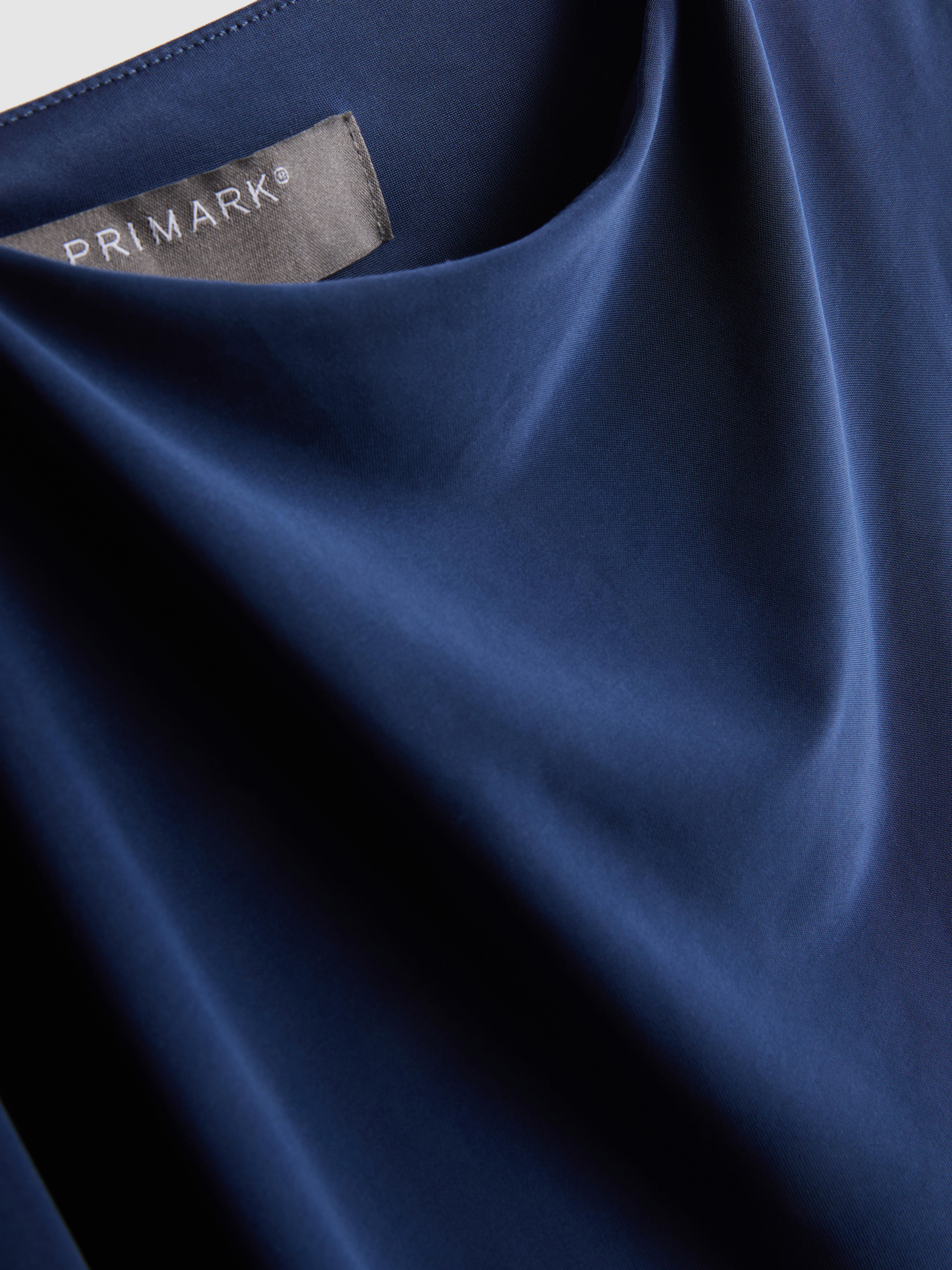 Asymmetric Cape Top