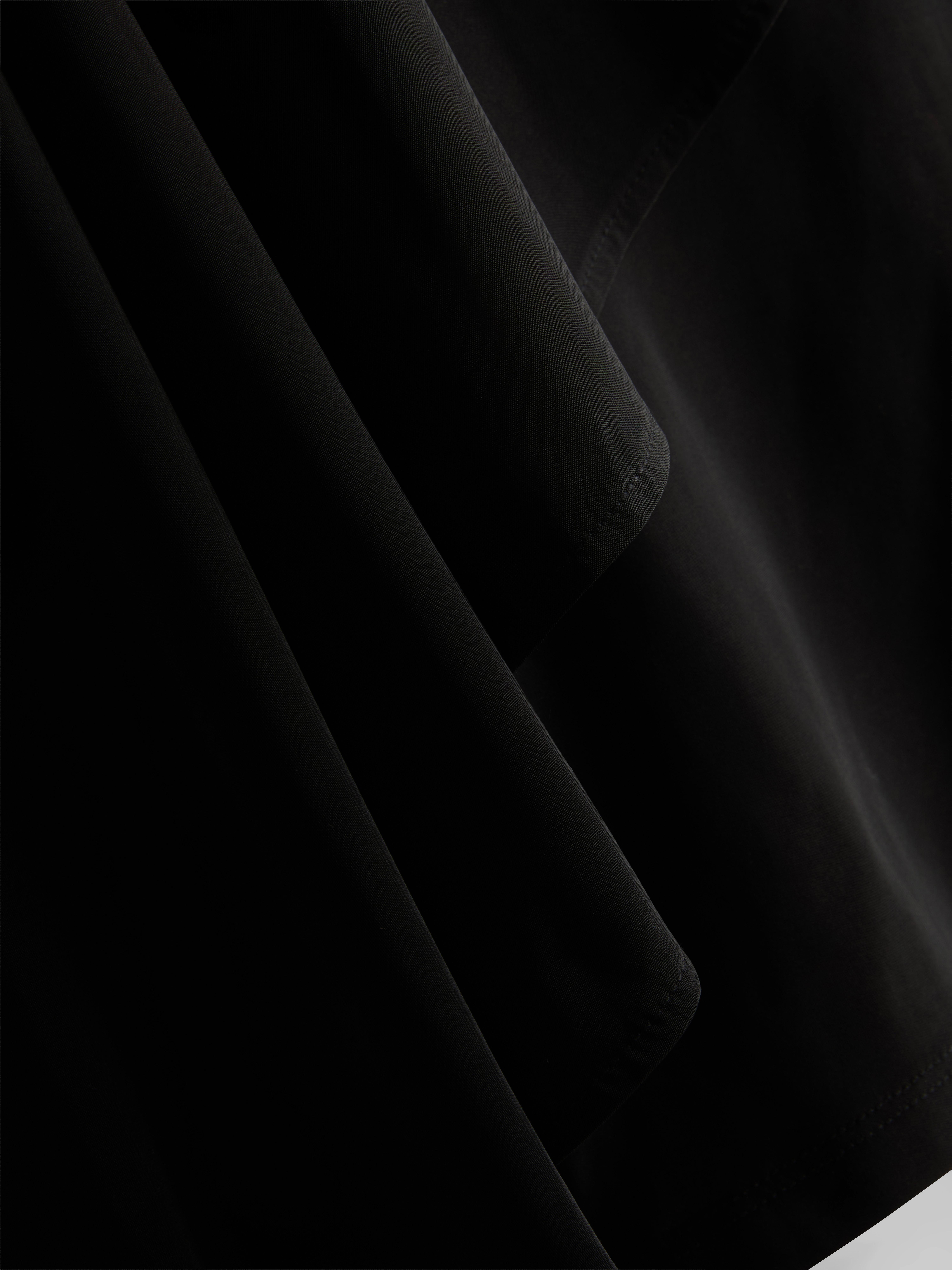 Asymmetric Cape Top