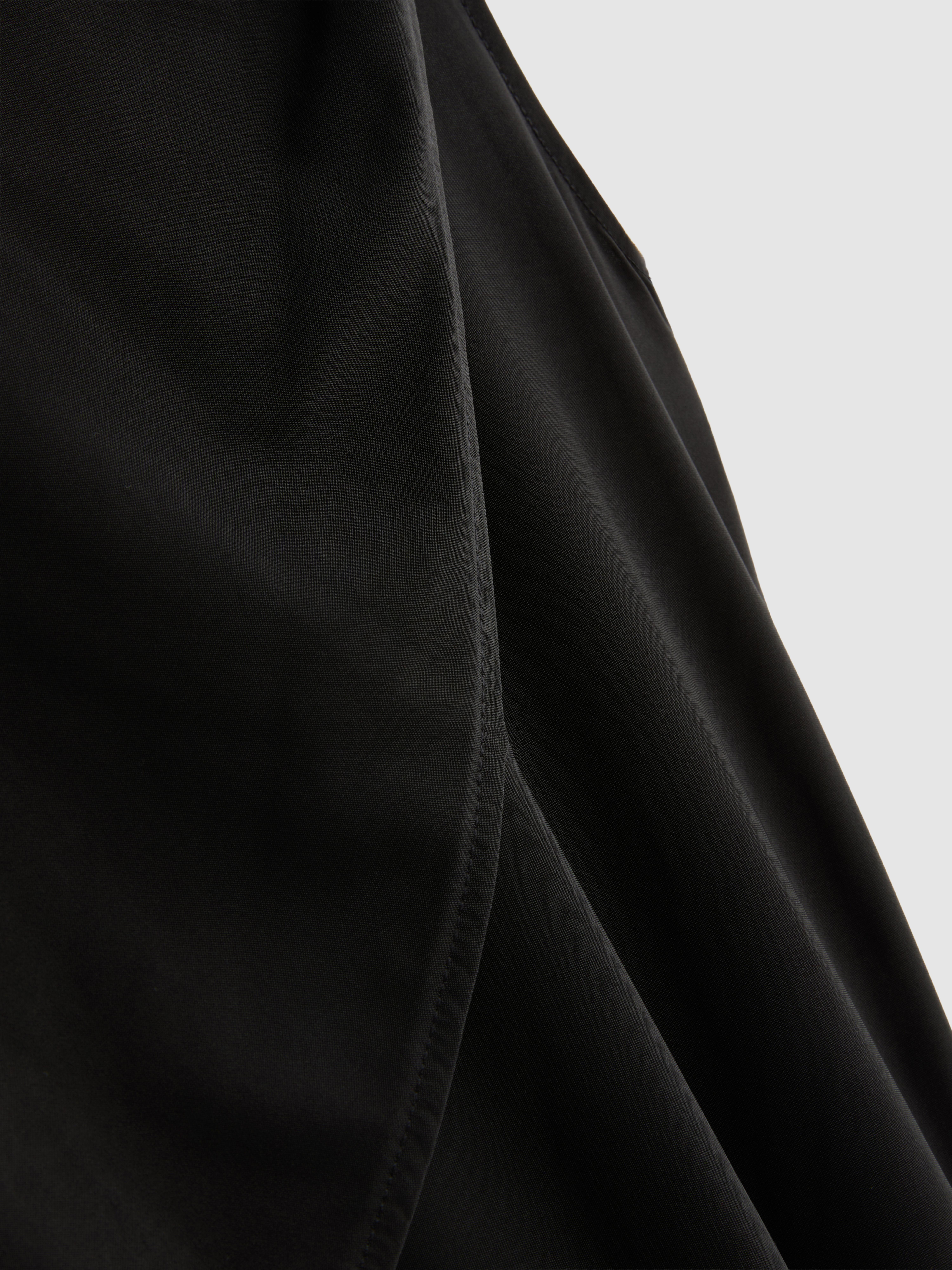 Asymmetric Cape Top