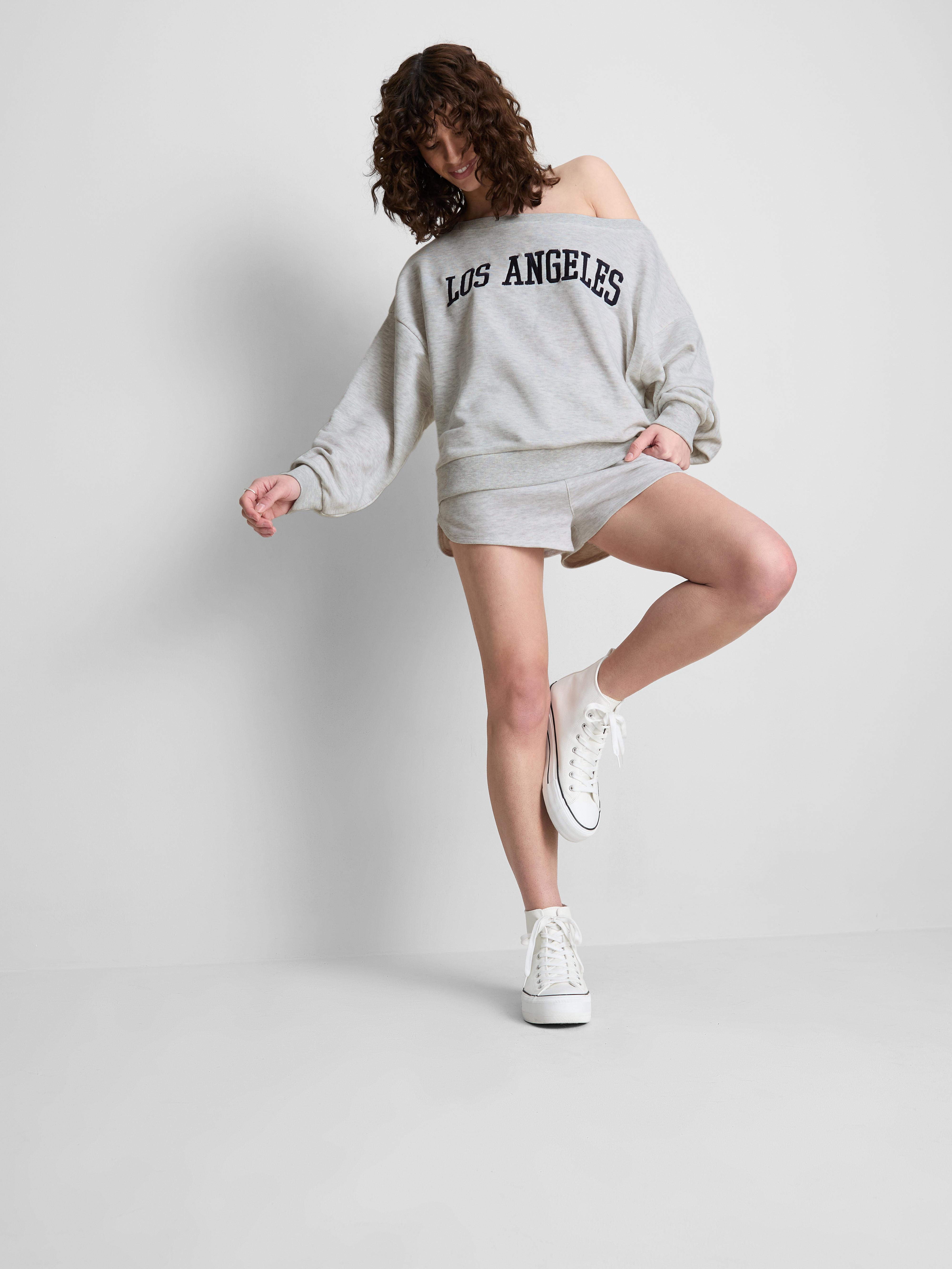 The Primark Scene | Bluza z odsłoniętymi ramionami i napisem