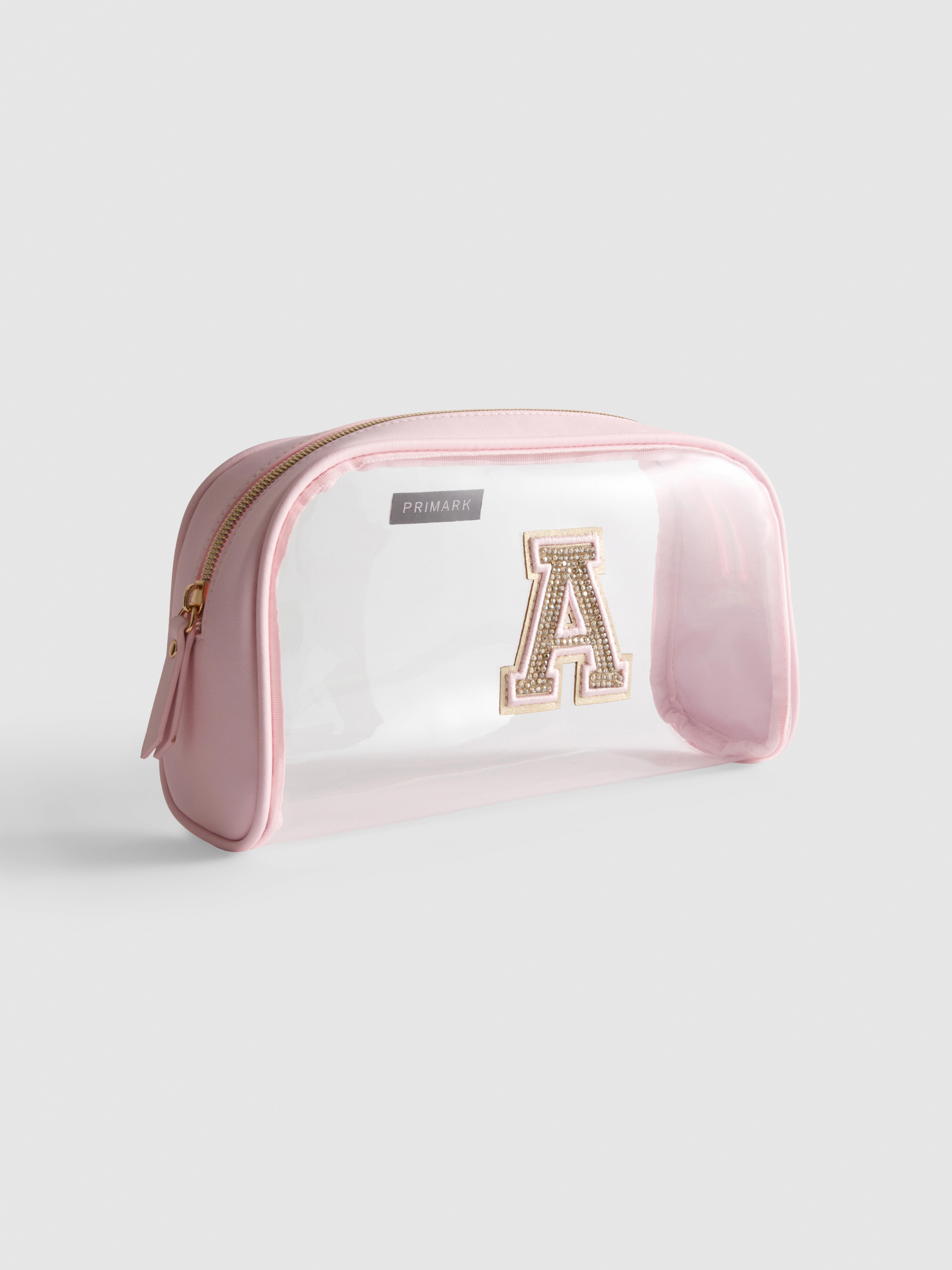 Bolsa de maquillaje transparente con inicial