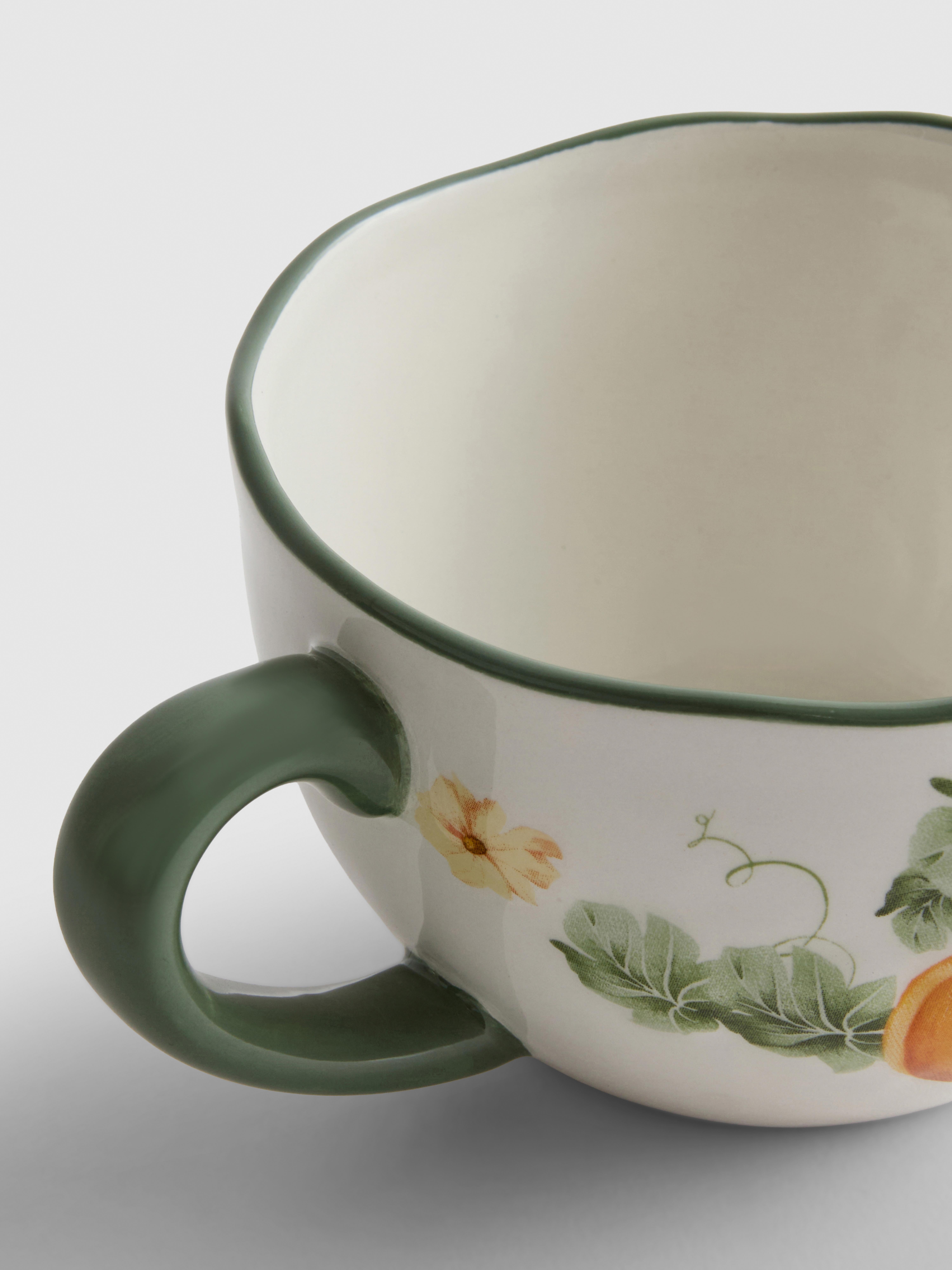Mok met pompoenprint