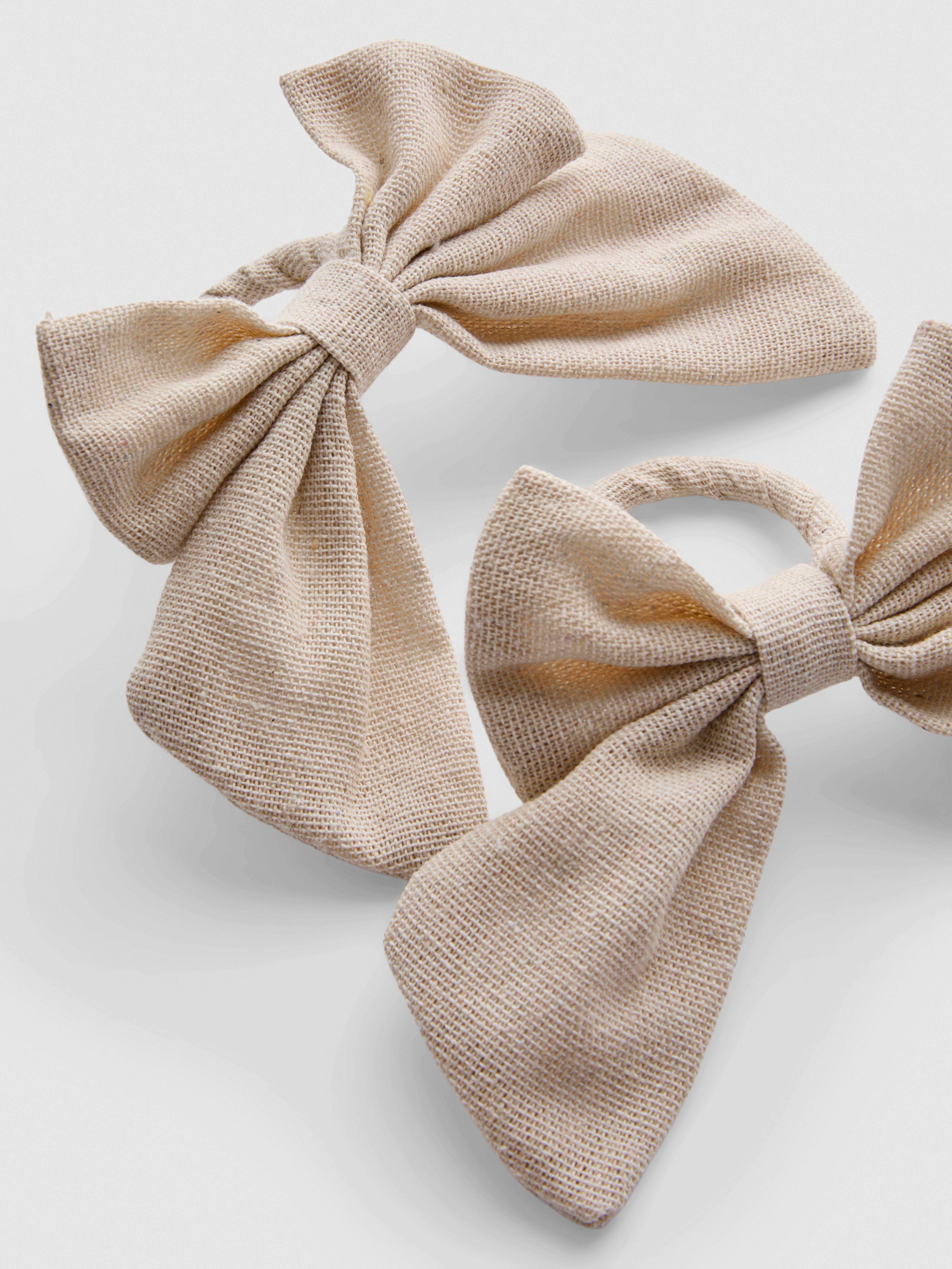 Lot de 2 ronds de serviette à nœud