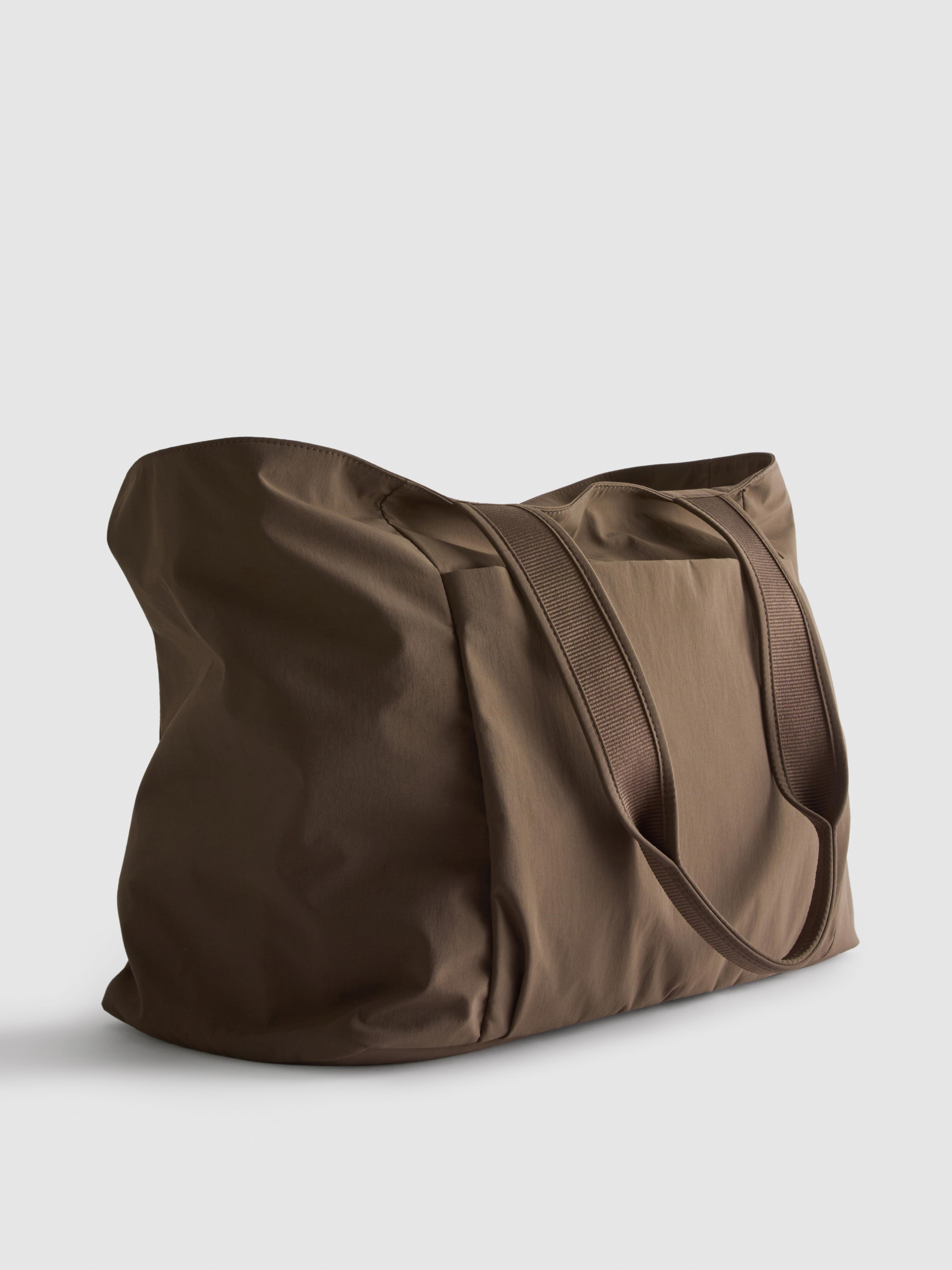 bontrager race rain bag Castelli Race Rain Bag vs Bontrager RSL Rain Bag