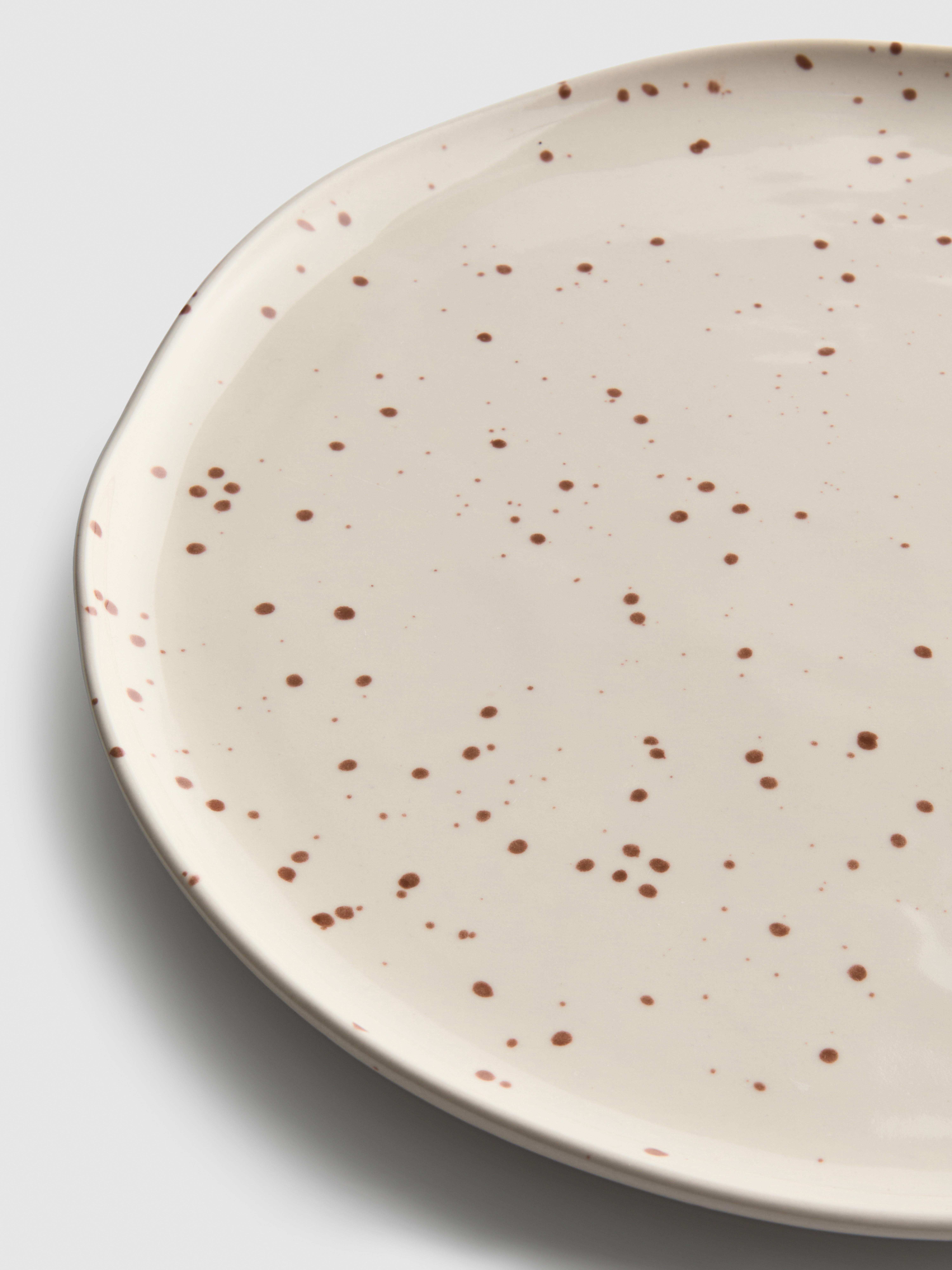 Gespikkeld dinerbord