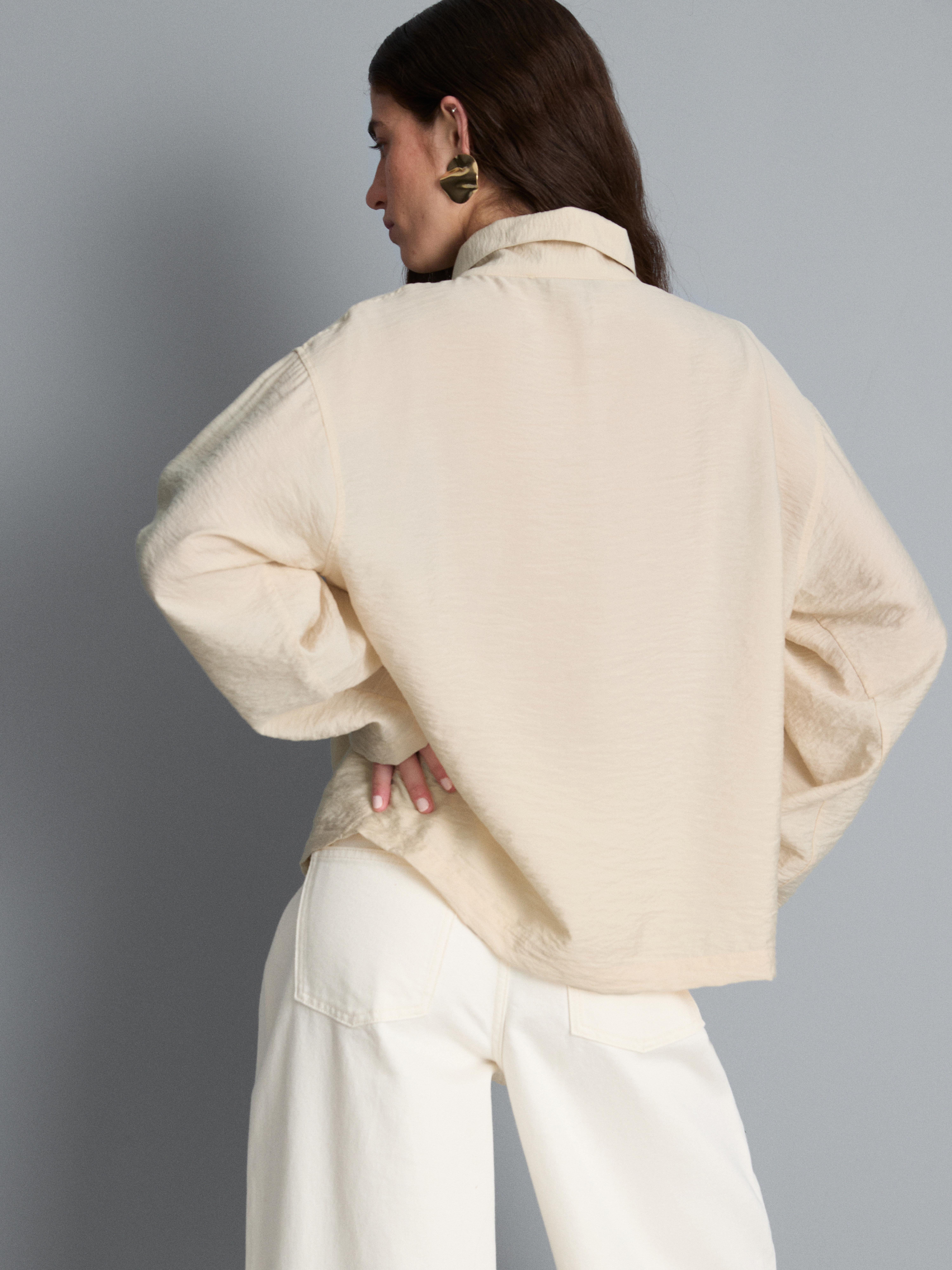 High Funnel Neck Button Detail Blouse