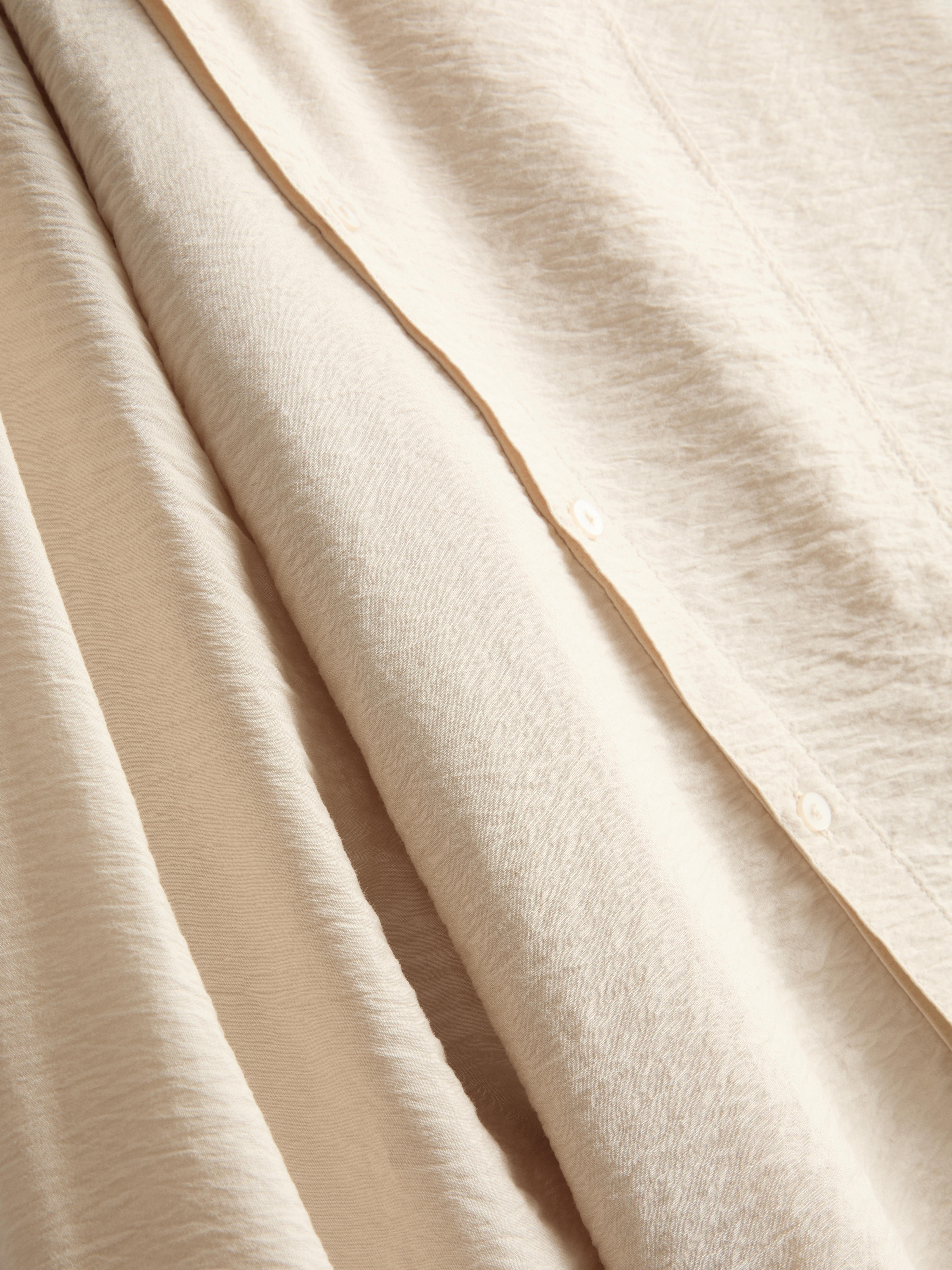 High Funnel Neck Button Detail Blouse