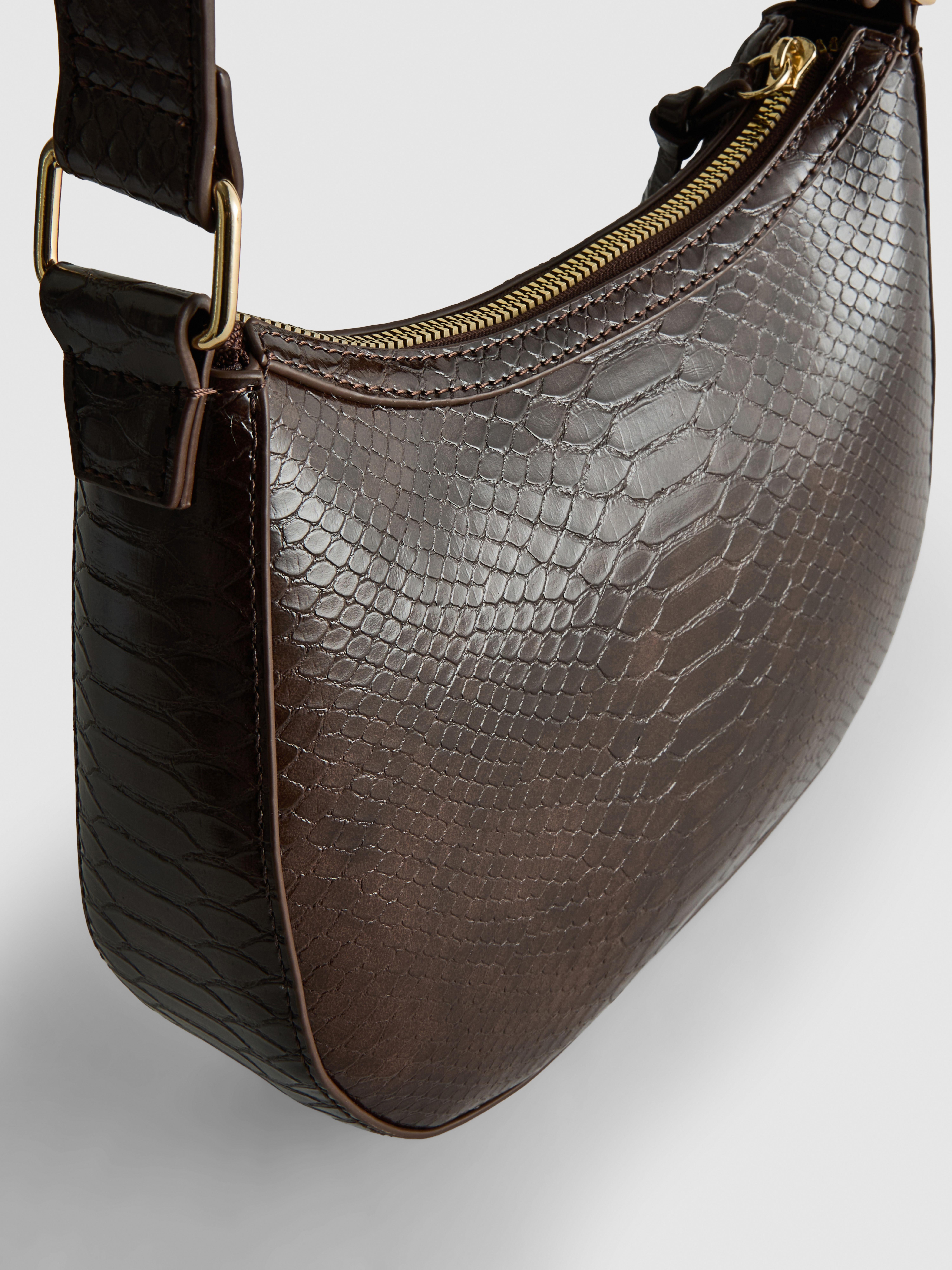Sac bandoulière en simili cuir à mors