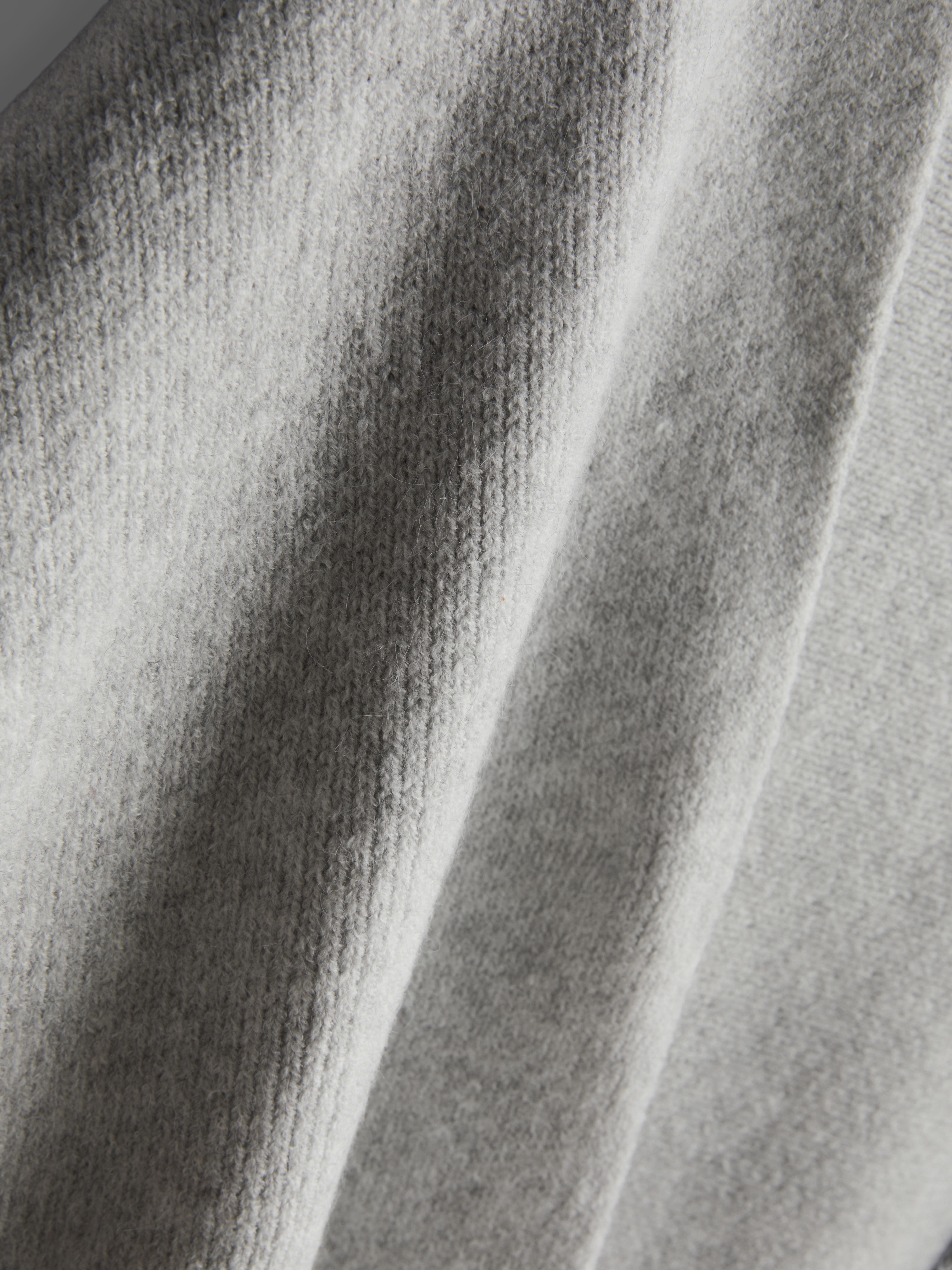 Paula Echevarría Fringed Ruana Scarf
