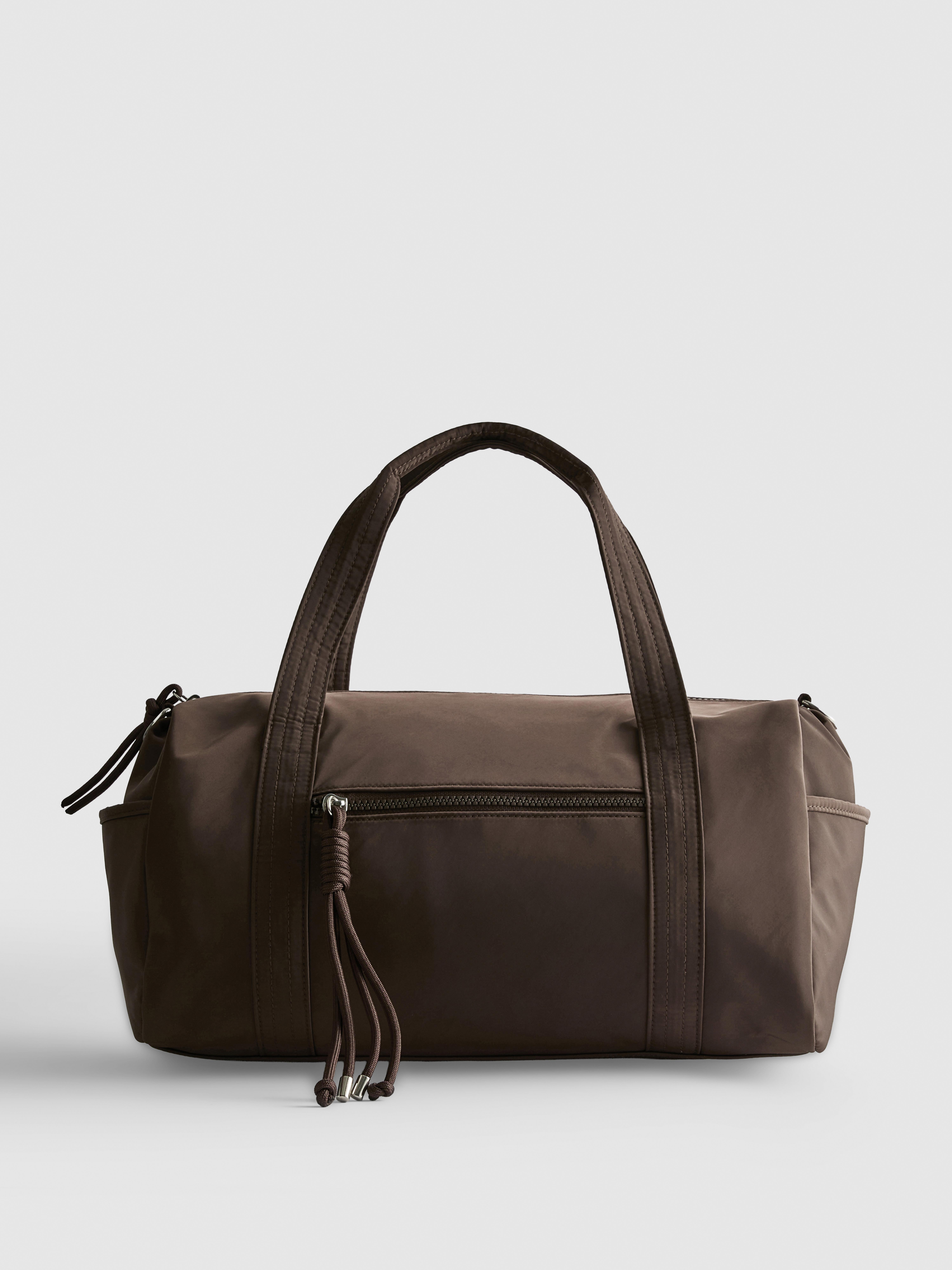 Zip Pocket Barrel Bag