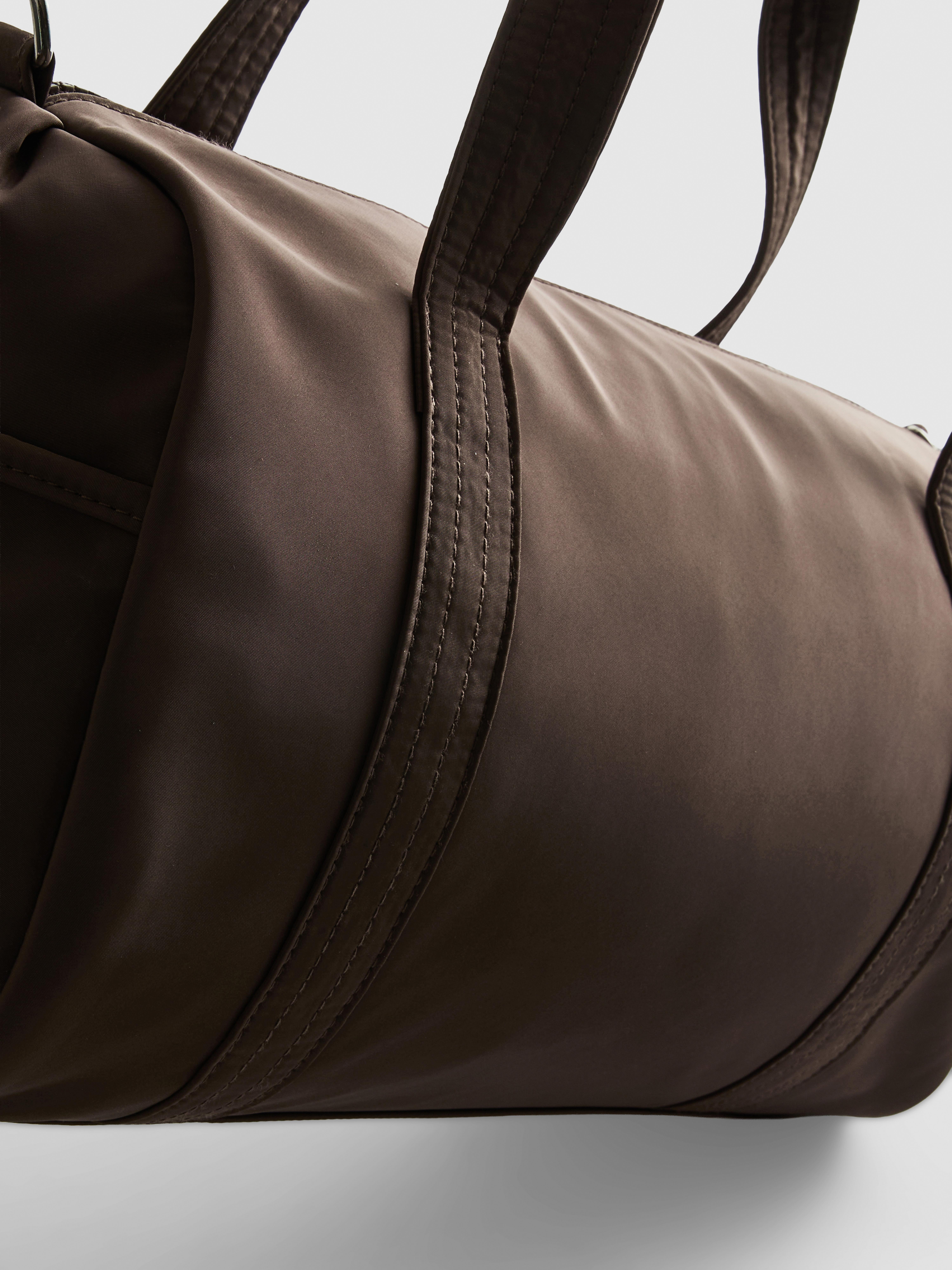 Zip Pocket Barrel Bag