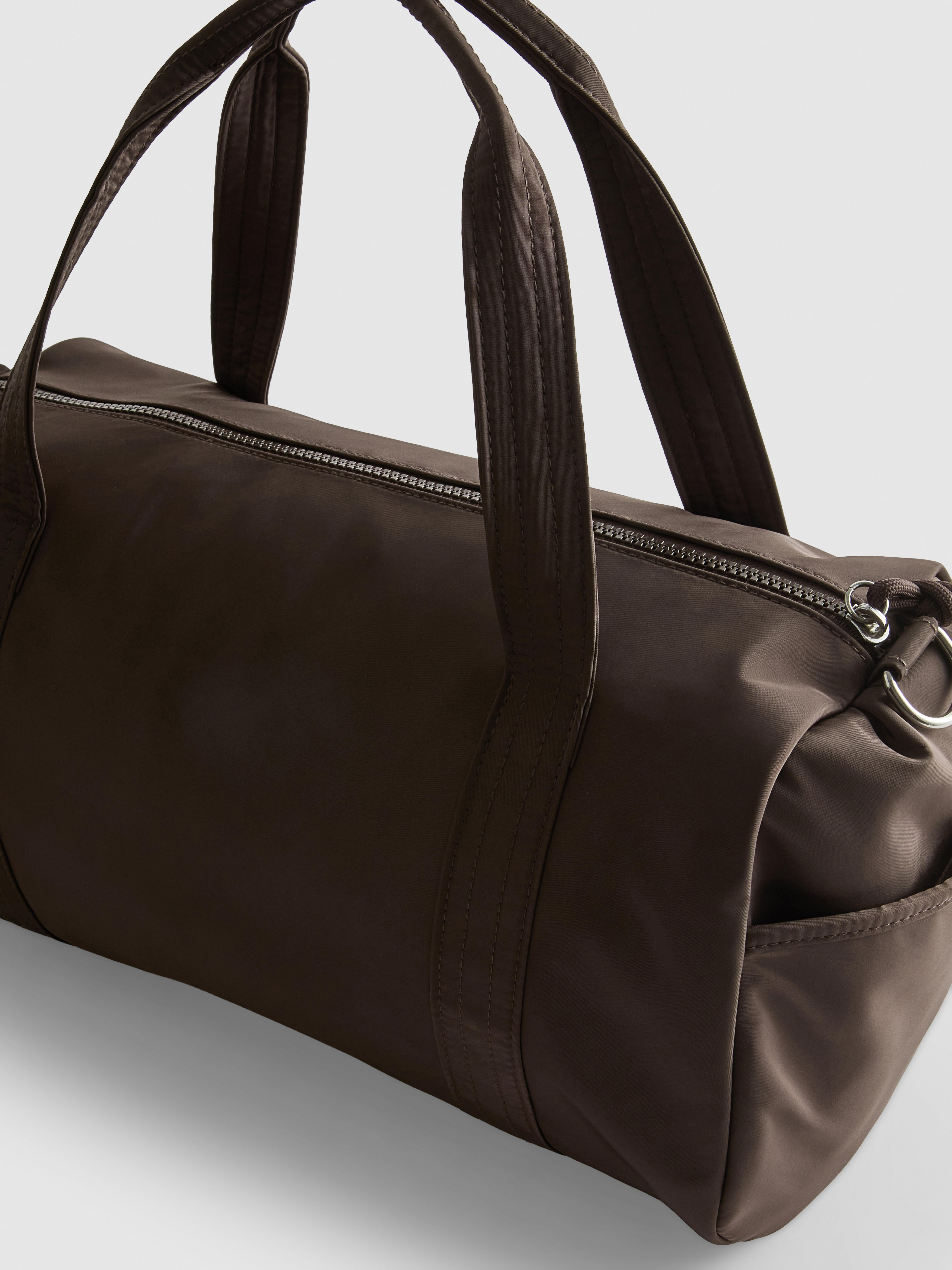 Zip Pocket Barrel Bag