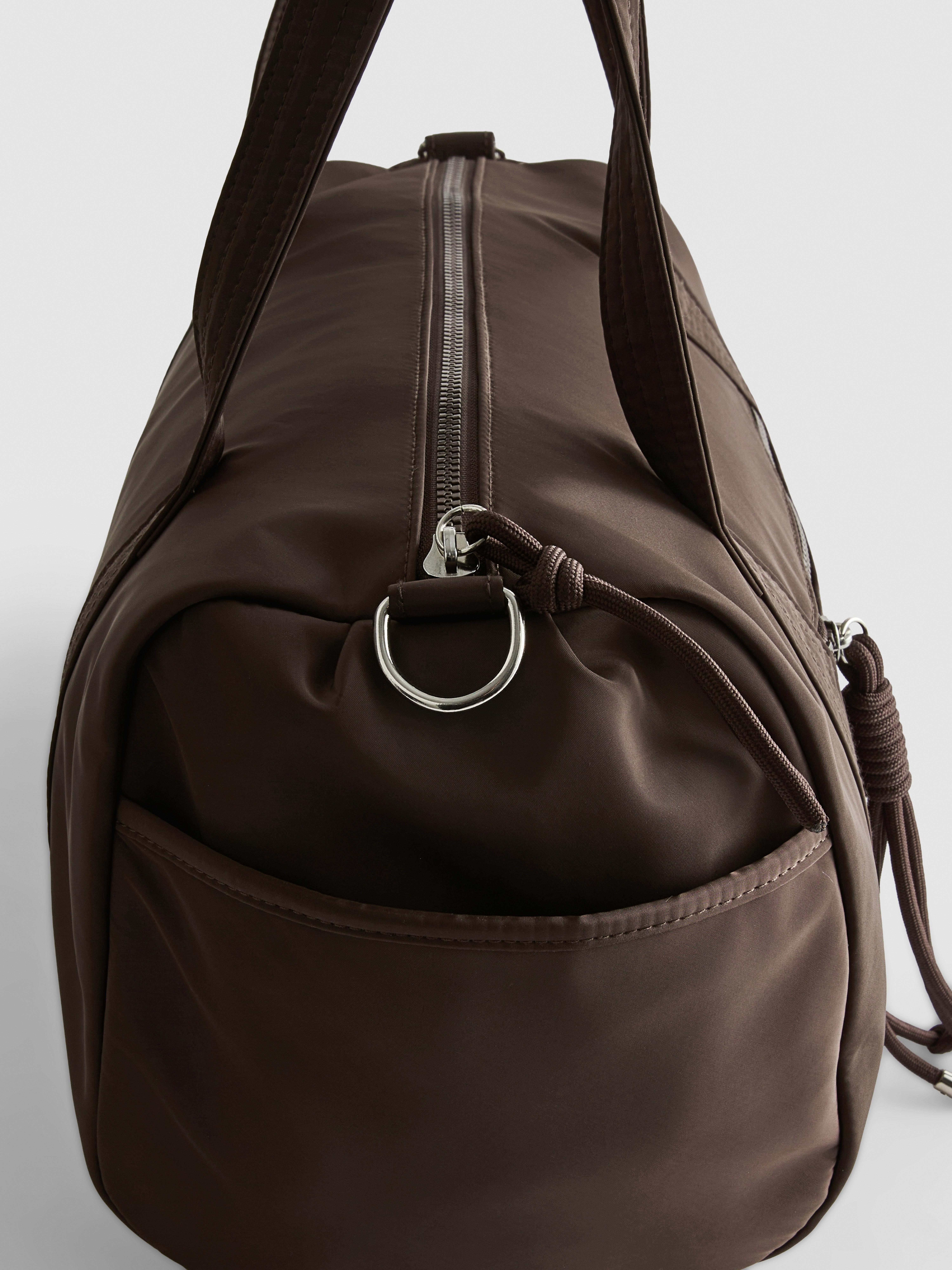 Zip Pocket Barrel Bag