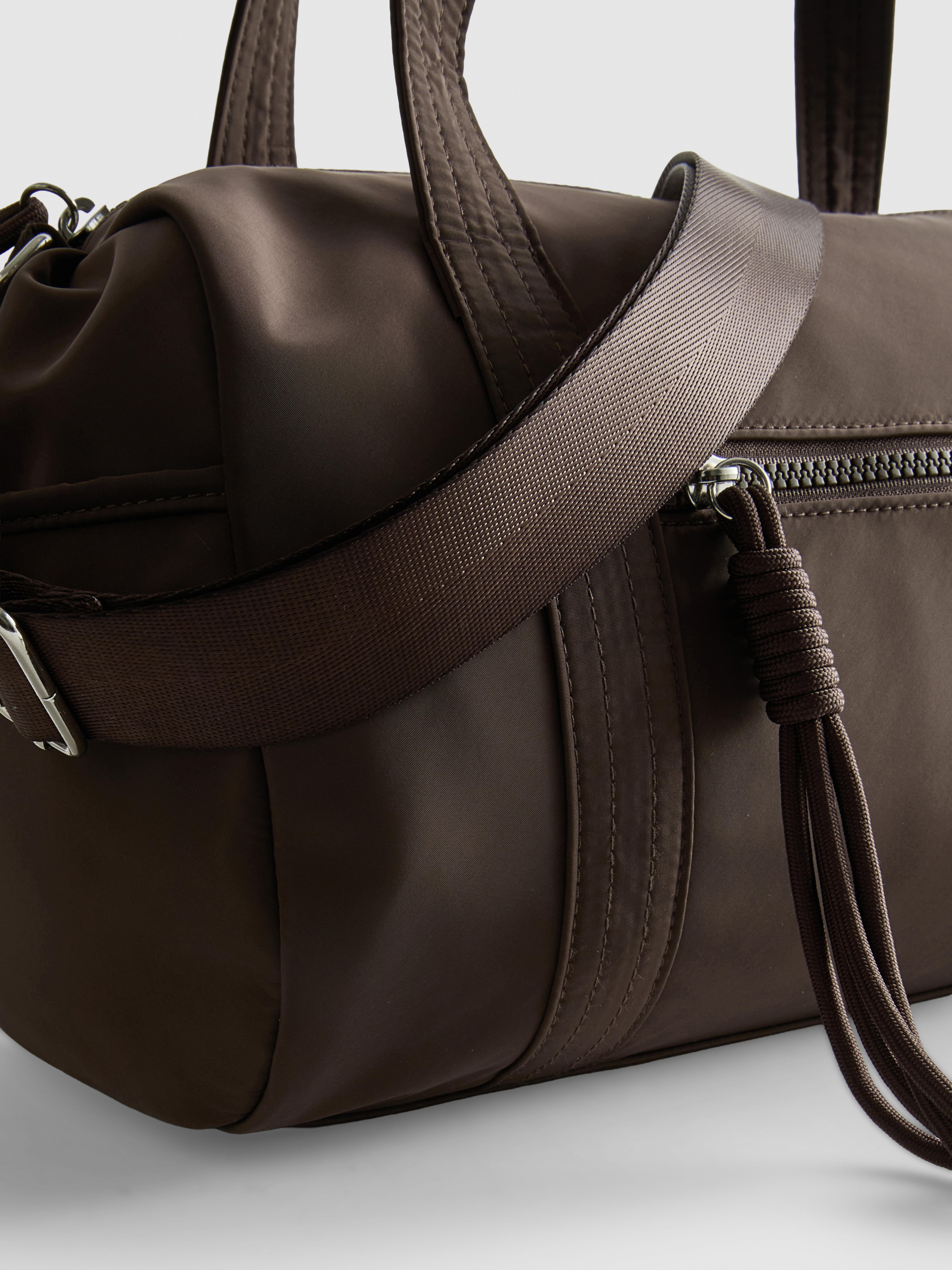 Women's Chocolate Zip Pocket Barrel Bag | Primark