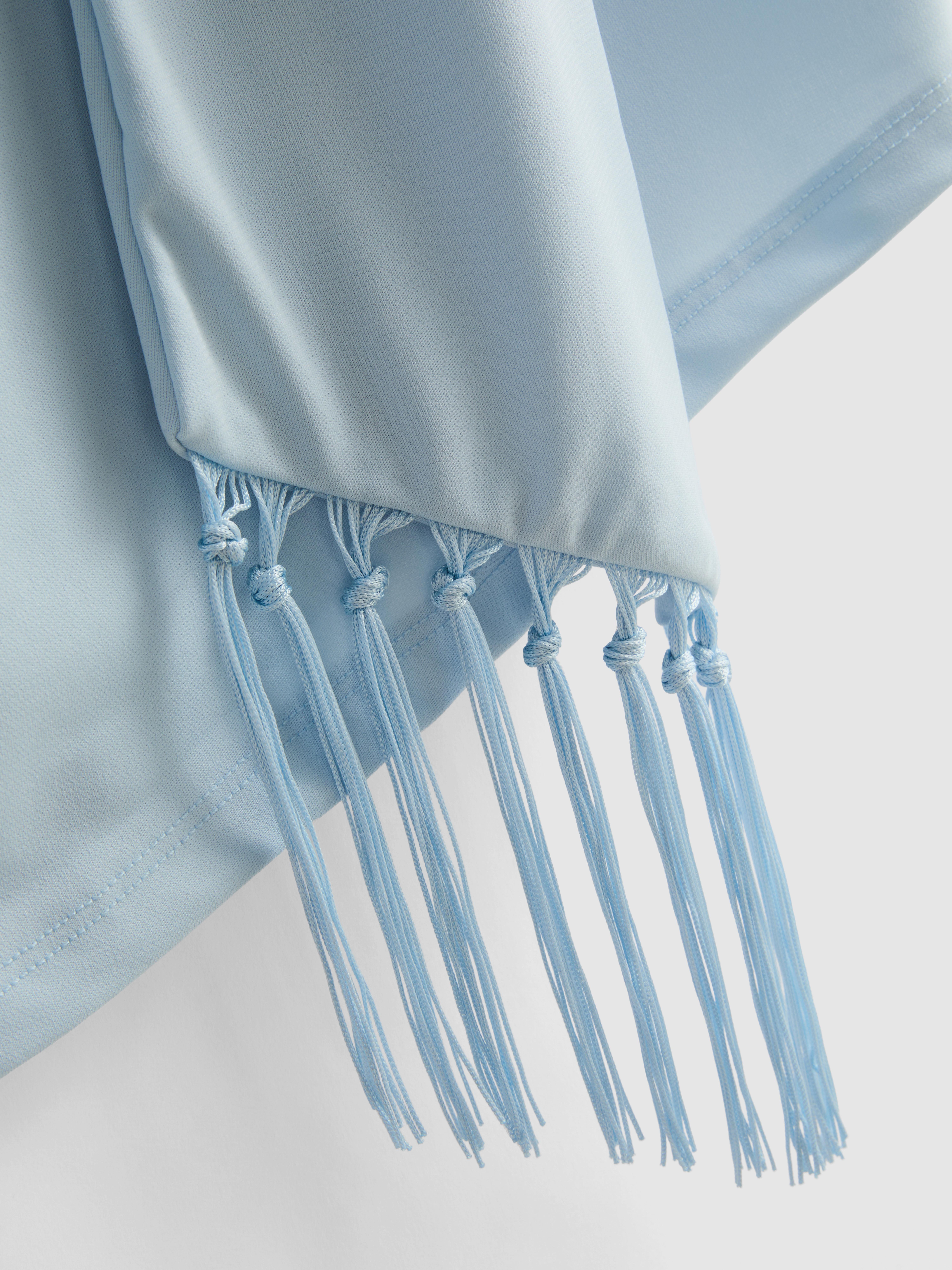 Jersey top met watervalkraag en franjes