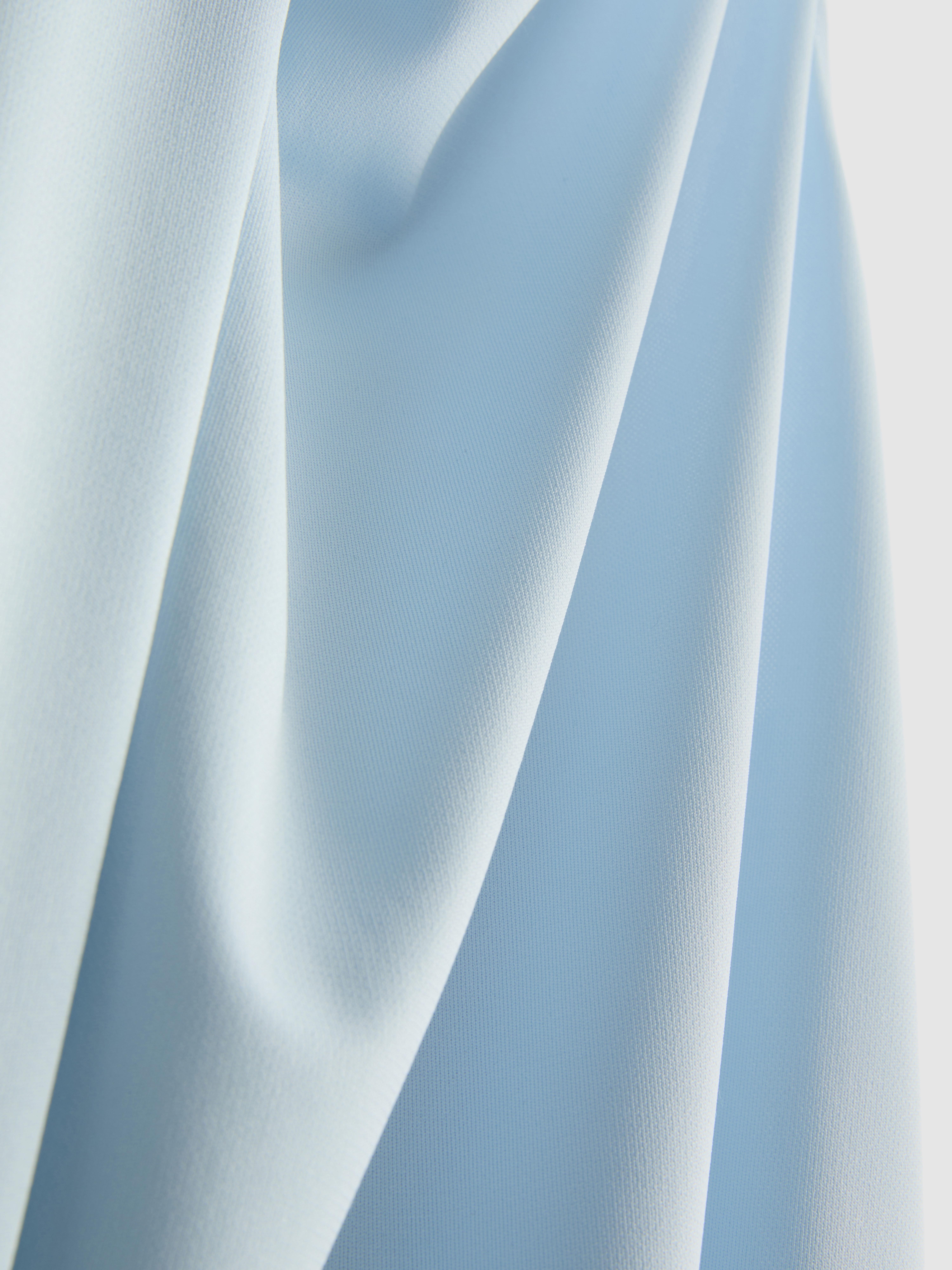 Jersey top met watervalkraag en franjes