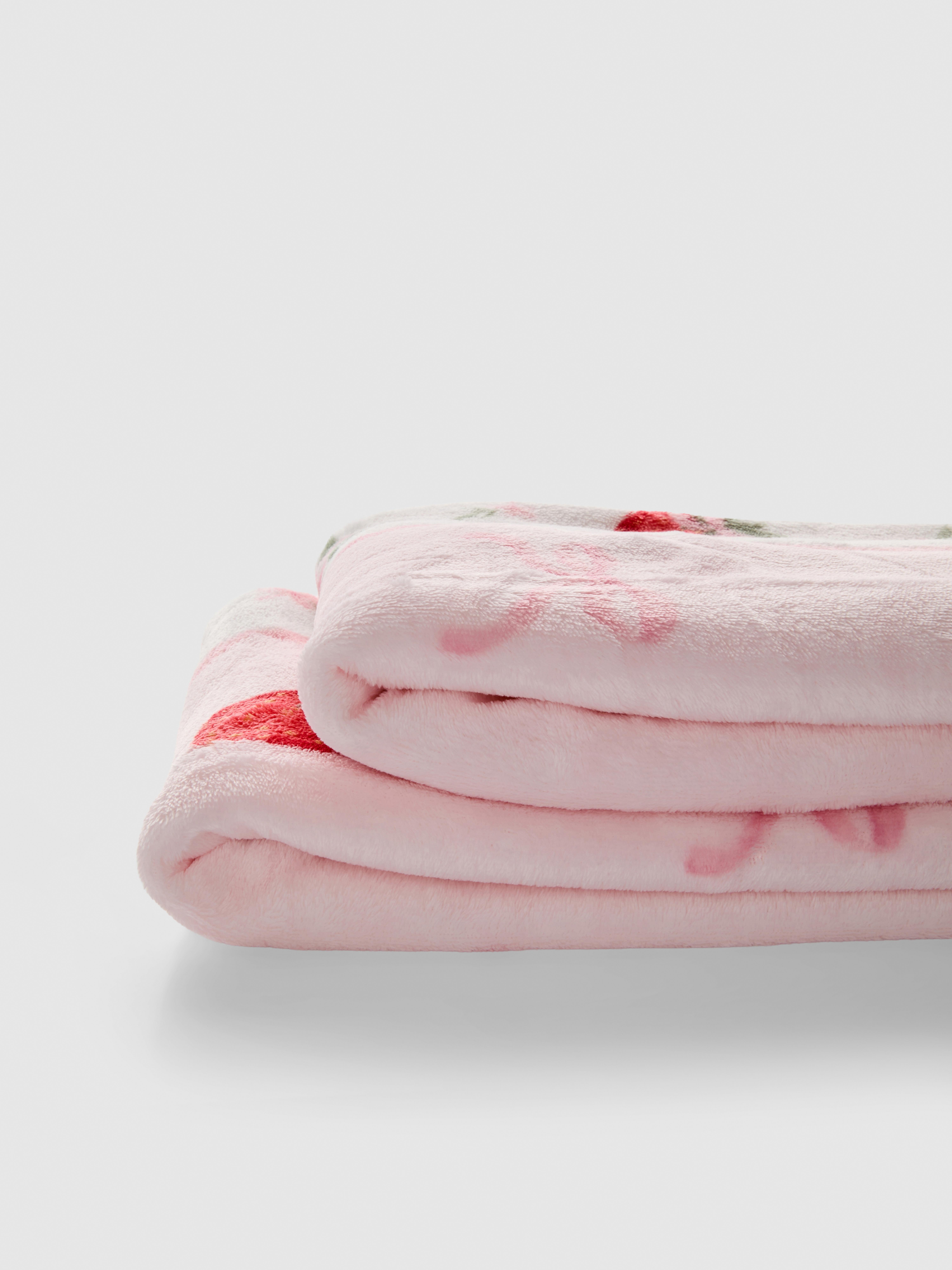 Coperta con fiocchi e fragole