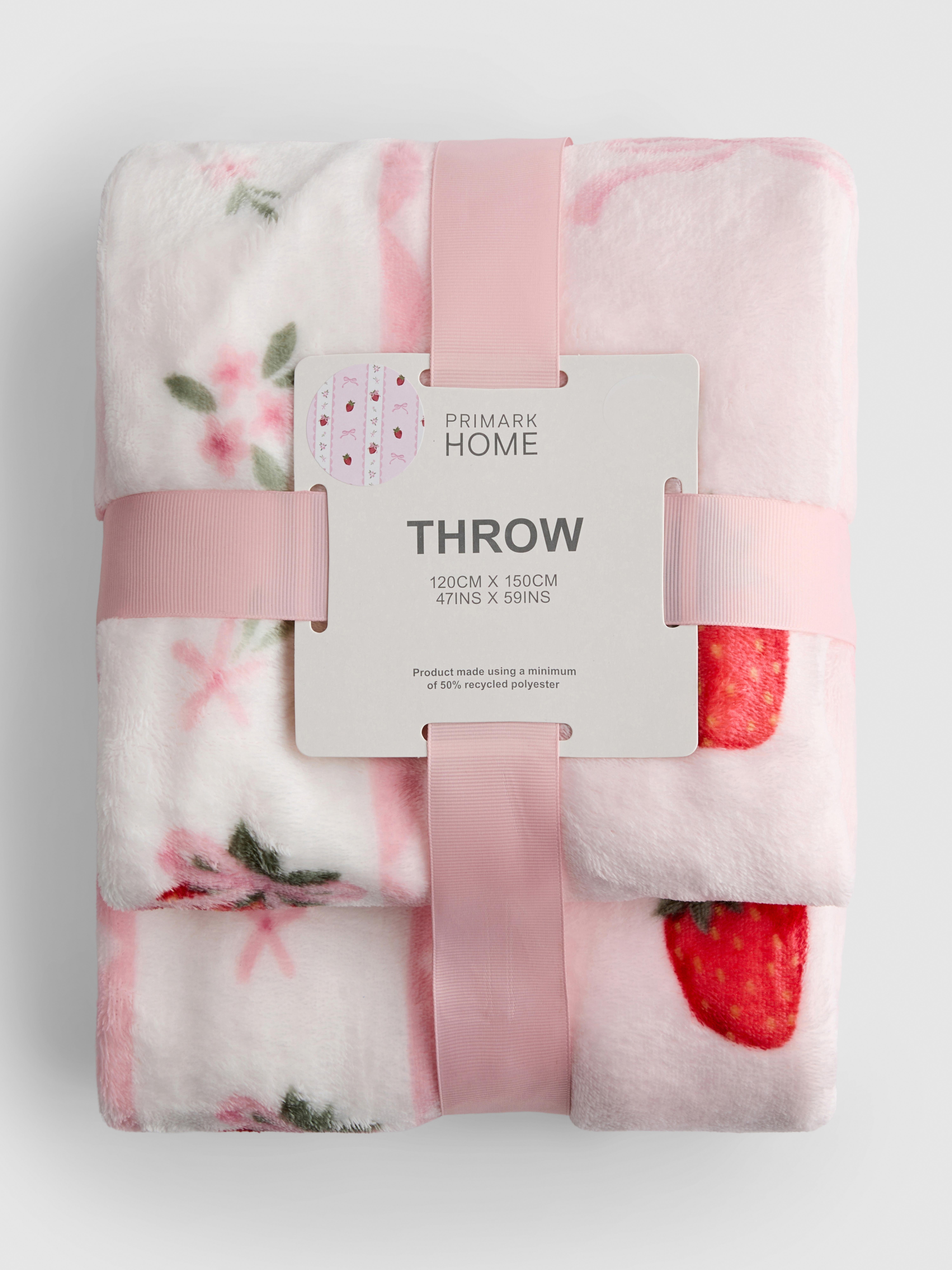Coperta con fiocchi e fragole