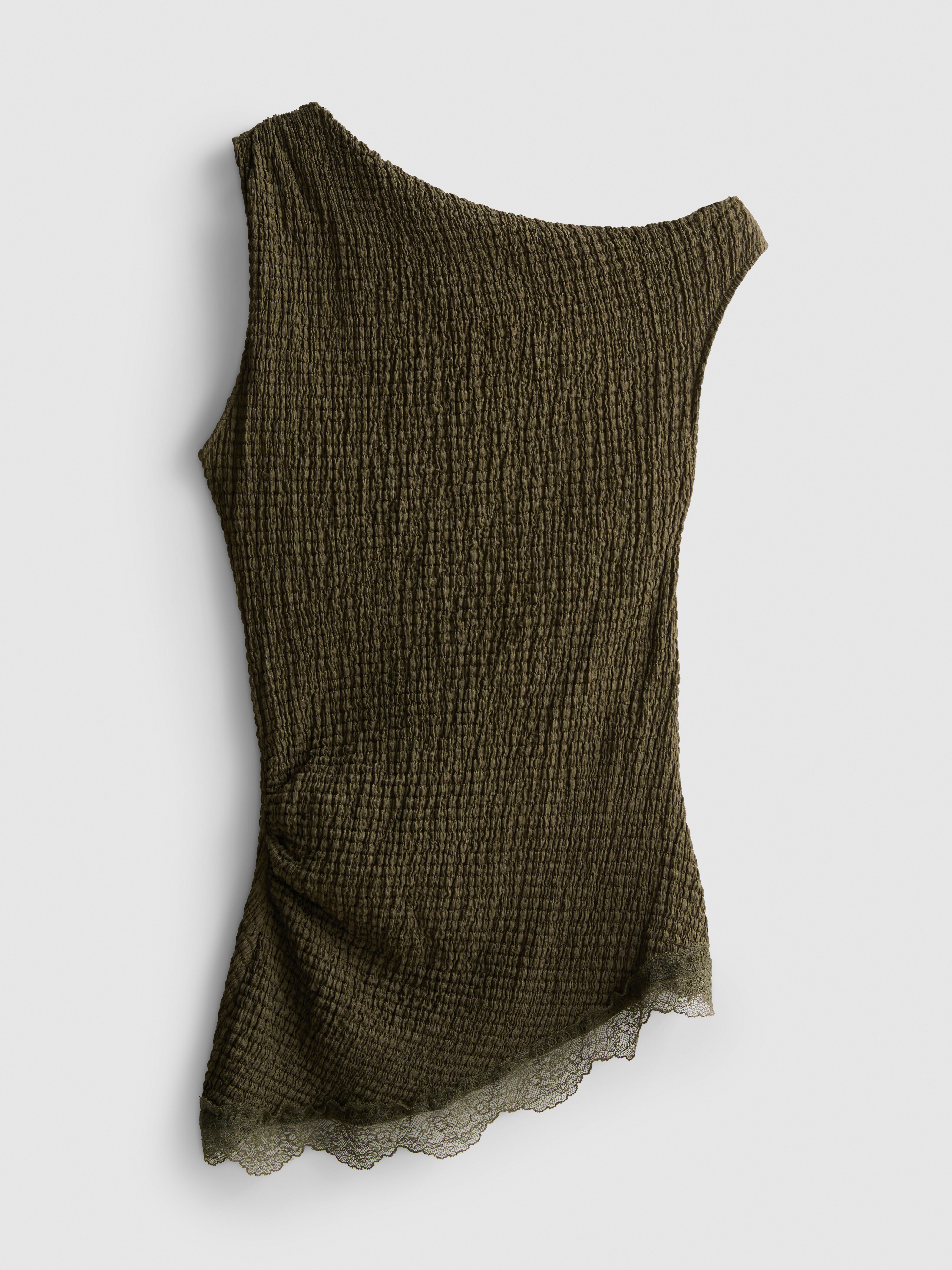 Top con bordo in pizzo asimmetrico strutturato
