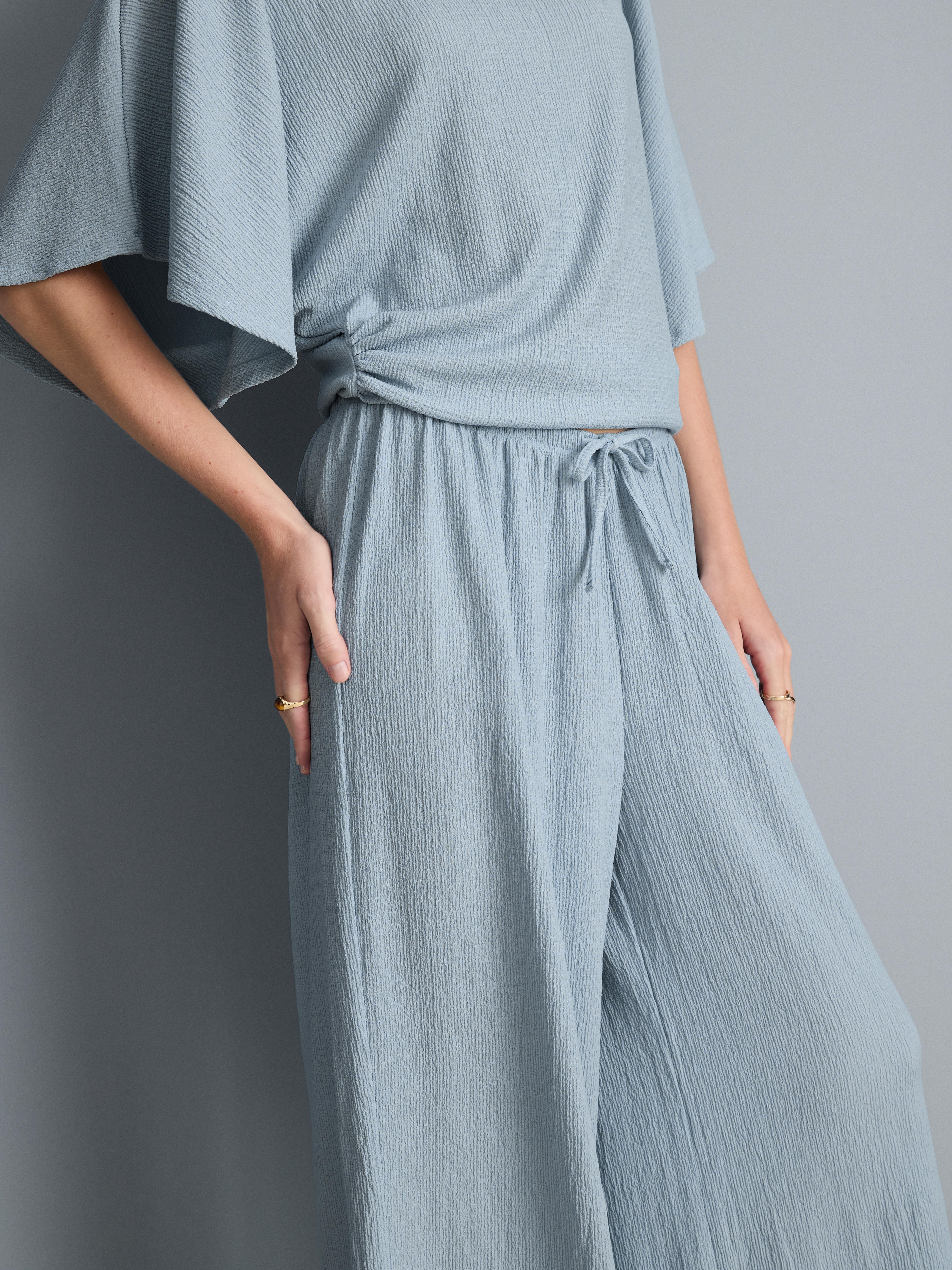 Pantalon large en tissu froncé