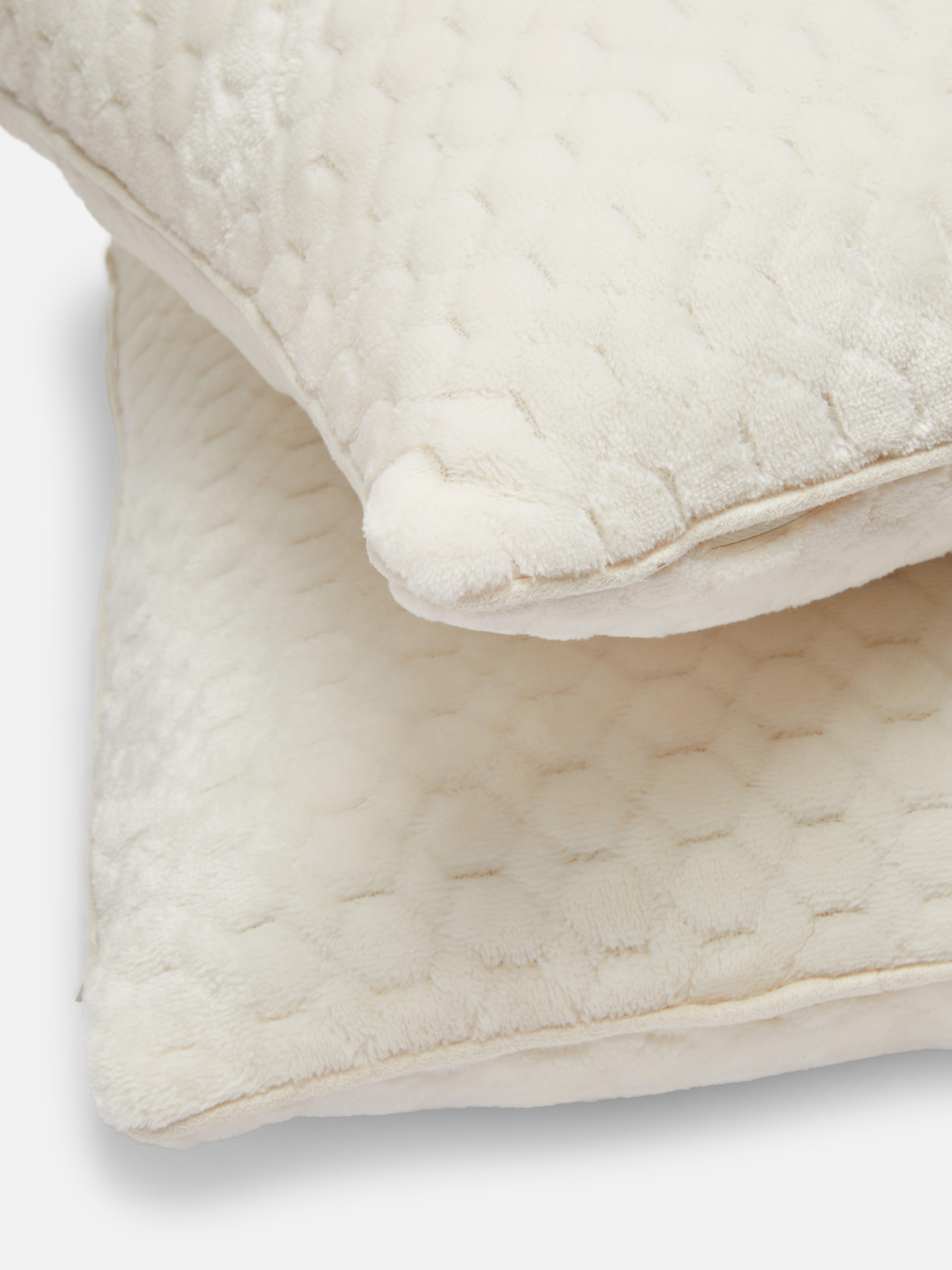 Lot de 2 coussins texturés effet nid d'abeille