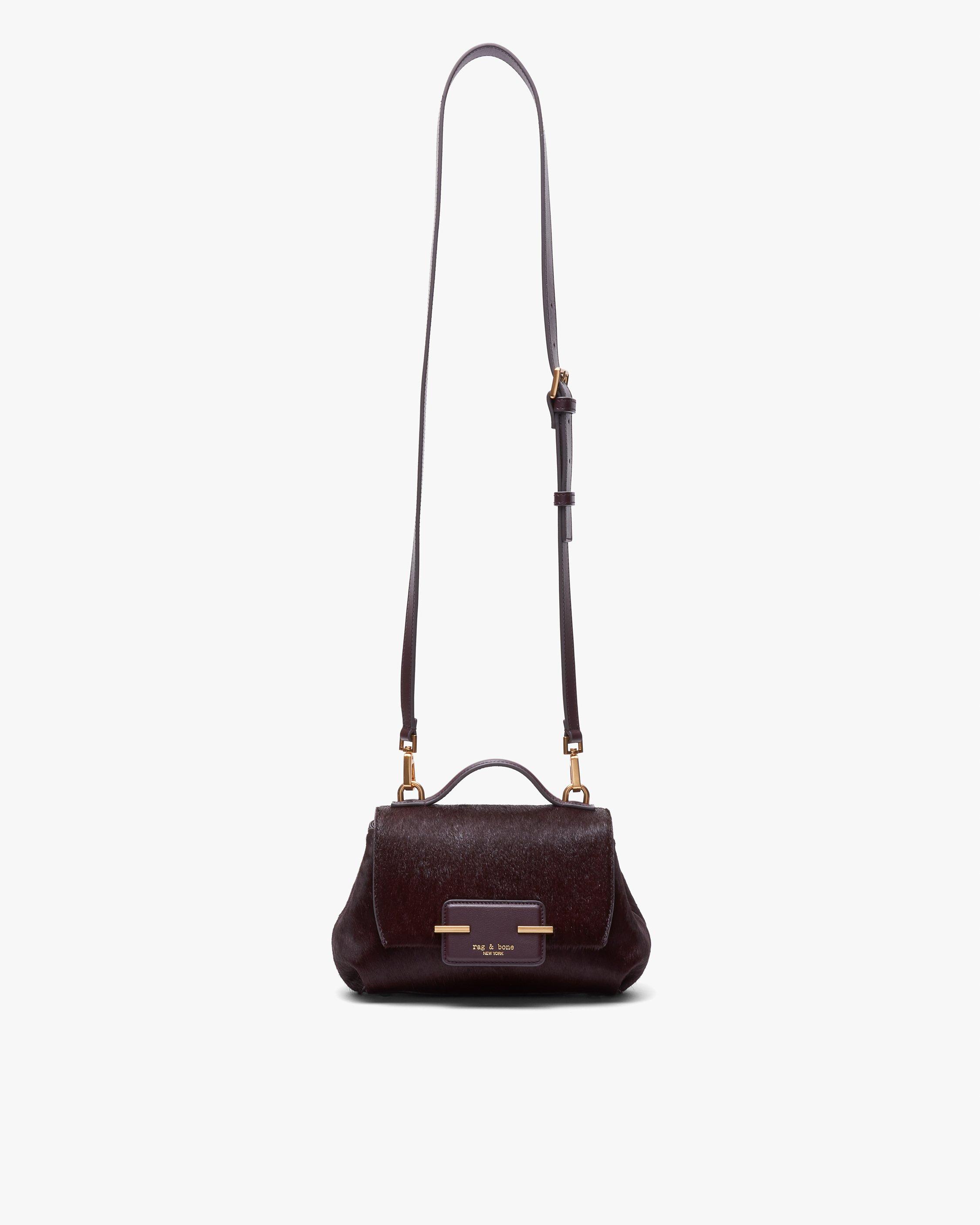 calf hair leather purse backpack Ariat Aztec Brown The bag can be worn as a classic backpack or a crossbody bag Medium Soho (Calf Hair) |