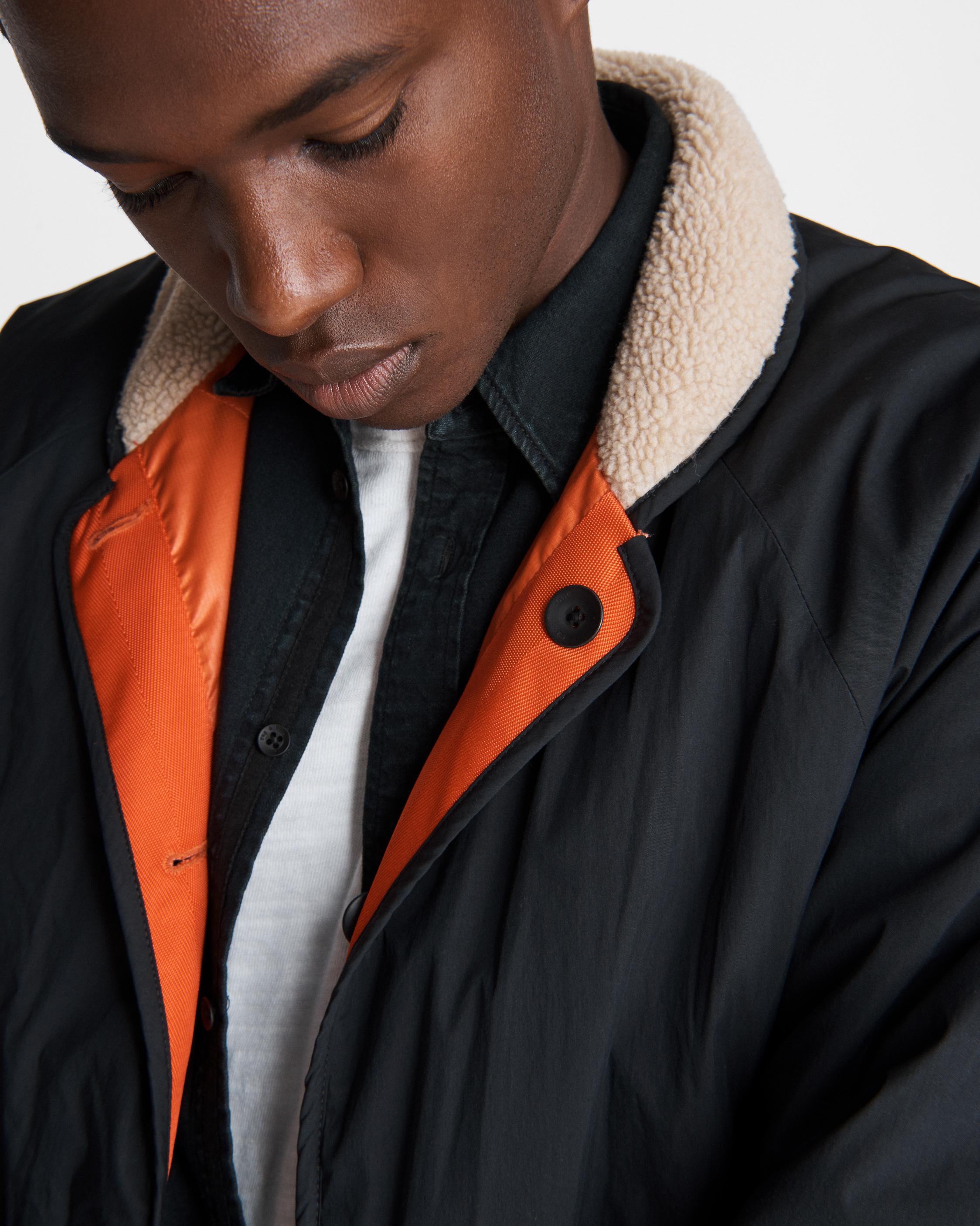 Jacket with 2025 orange lining