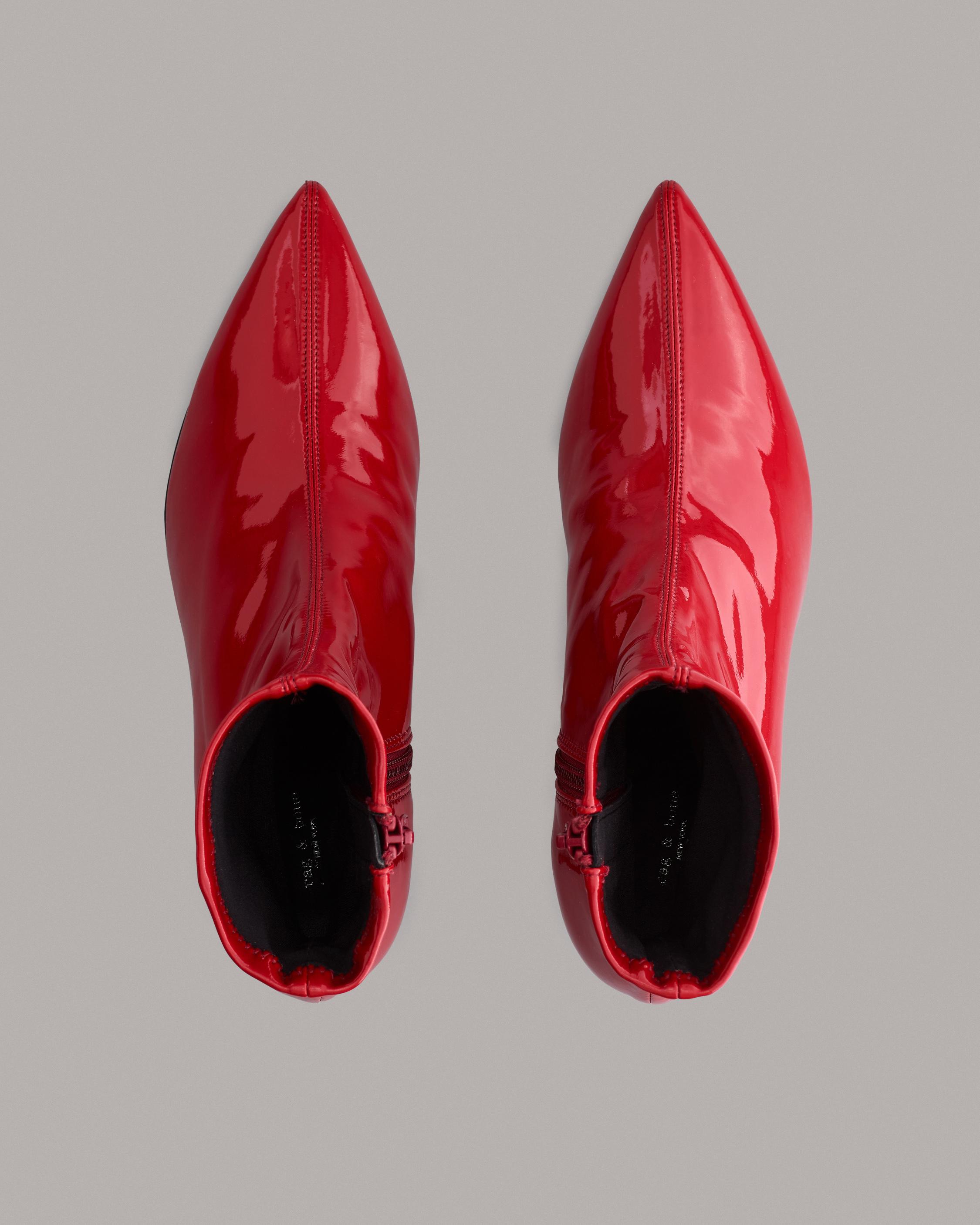 kirlah boot in patent plaid