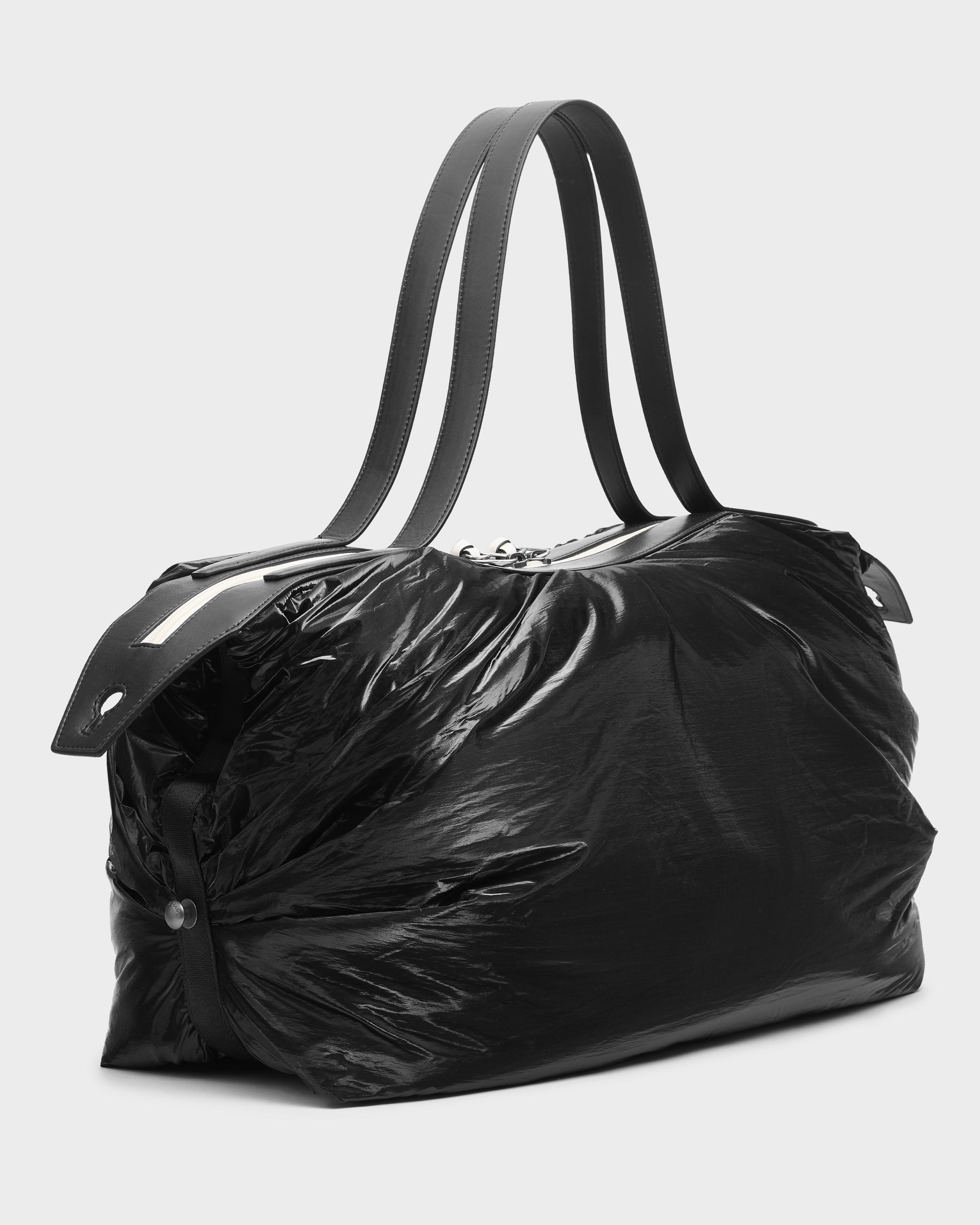 Rains® Hilo Weekend Bag in Black for $110 | Free Shipping