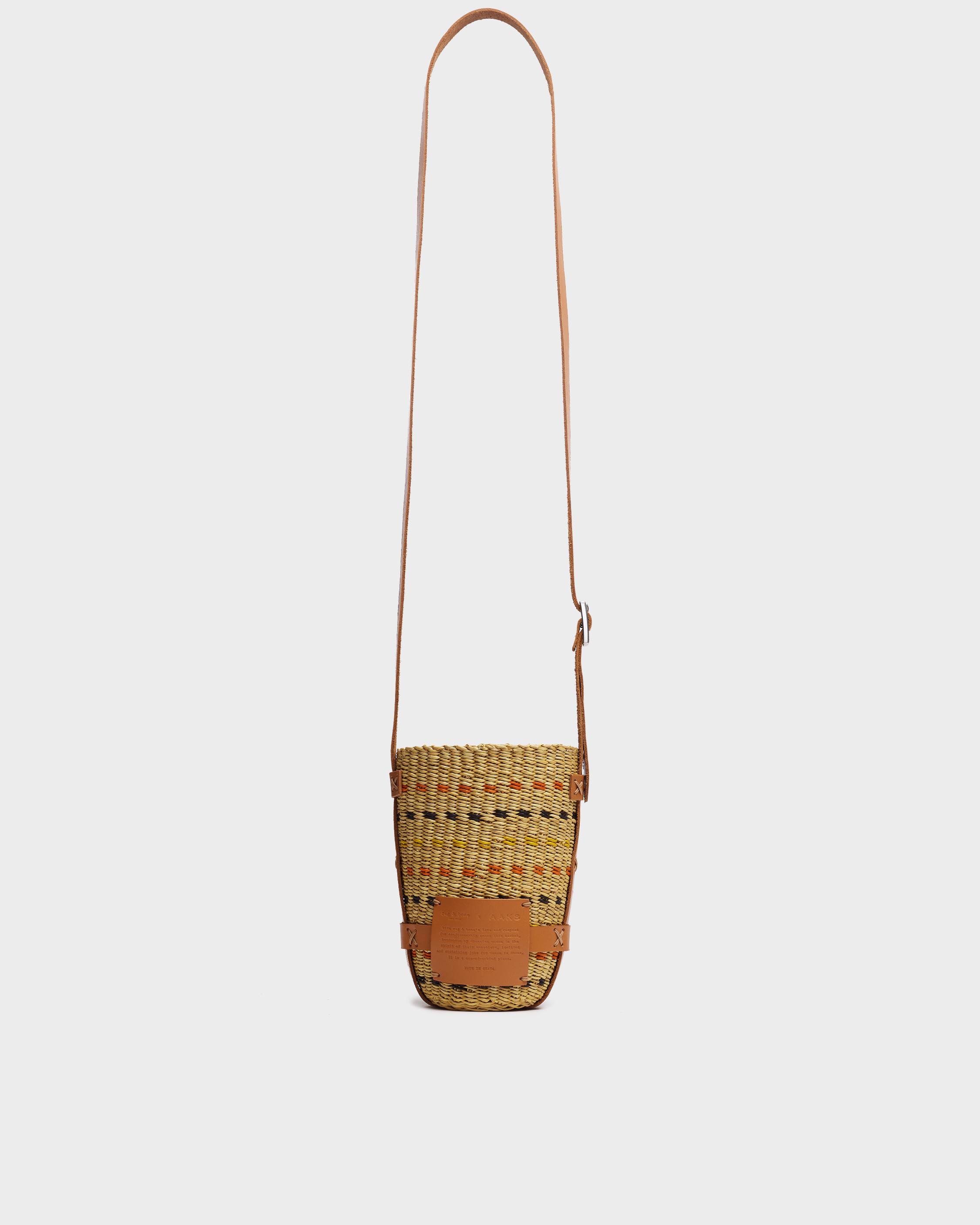 Shop LOEWE Pochette Leather-Trimmed Raffia Crossbody Bag