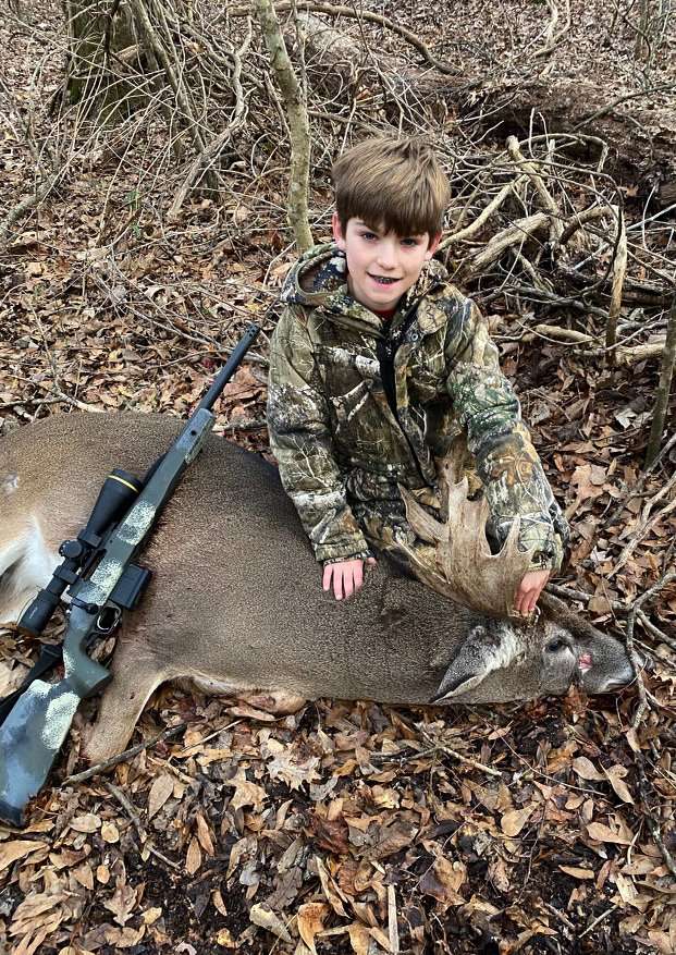 Fisher offered up a prayer of thanks after getting a shot at the buck.