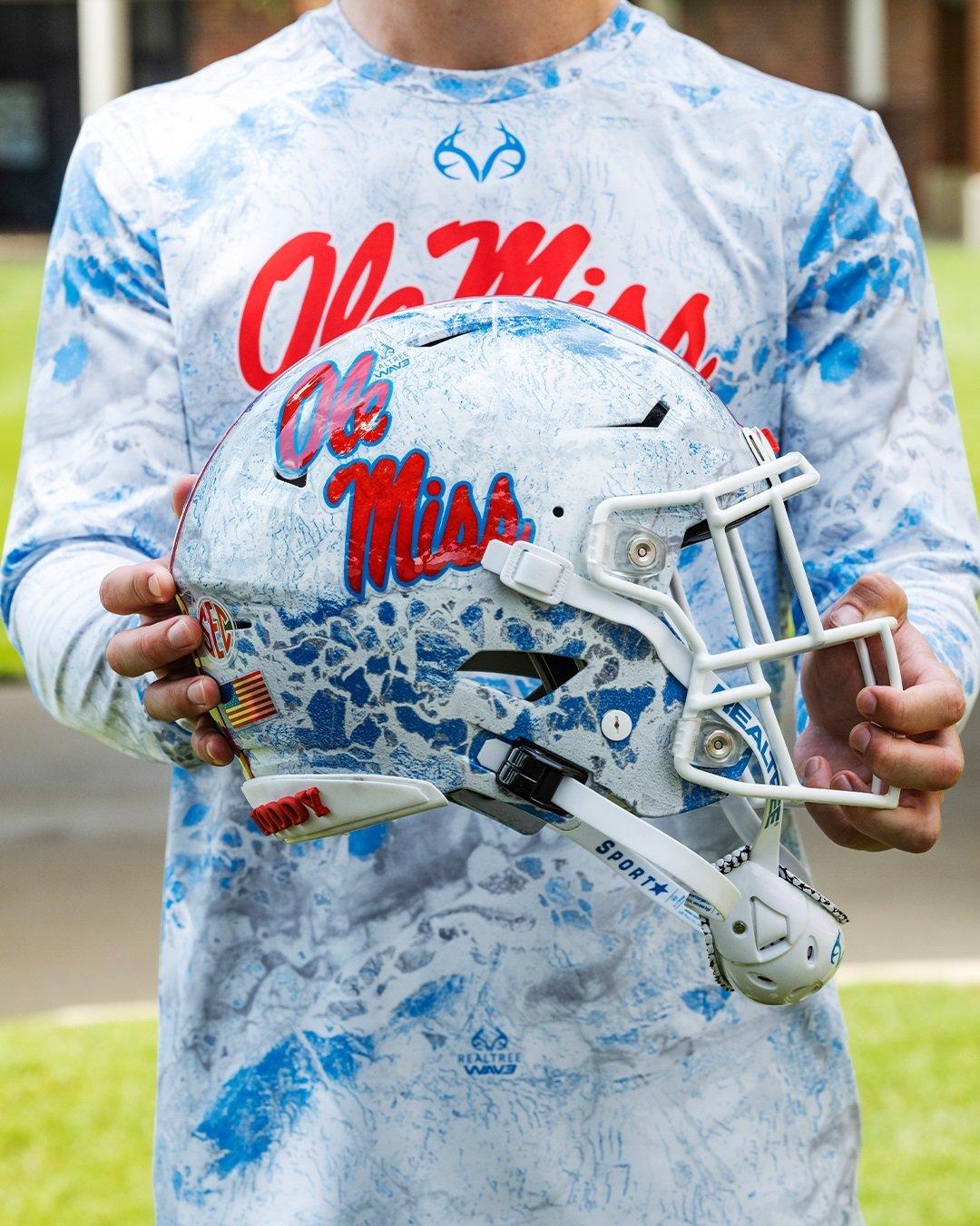  Ole Miss will host Kentucky while sporting an exclusive helmet showcasing a custom color scheme from Realtree. Image by Realtree