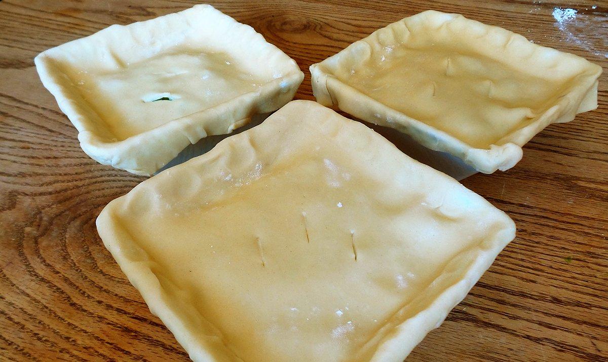 Crimp the edges of the crust tightly to the dish before baking.