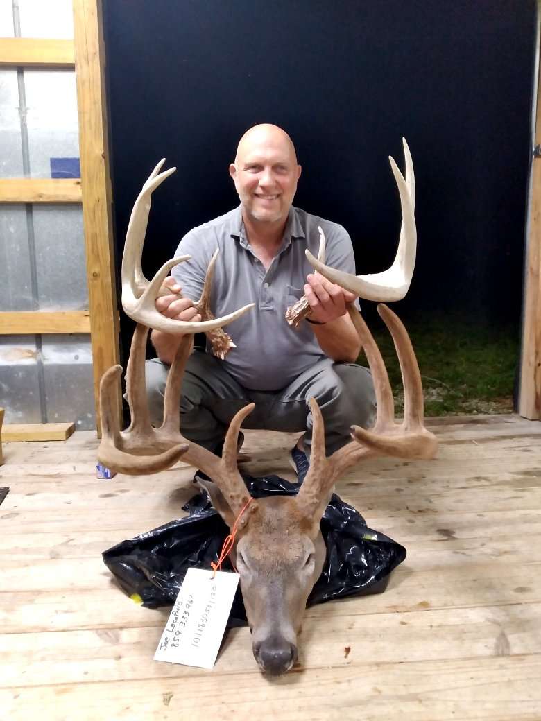 Lacefield compares his buck's sheds from last year to this year's rack. Image by Ashton Lacefield