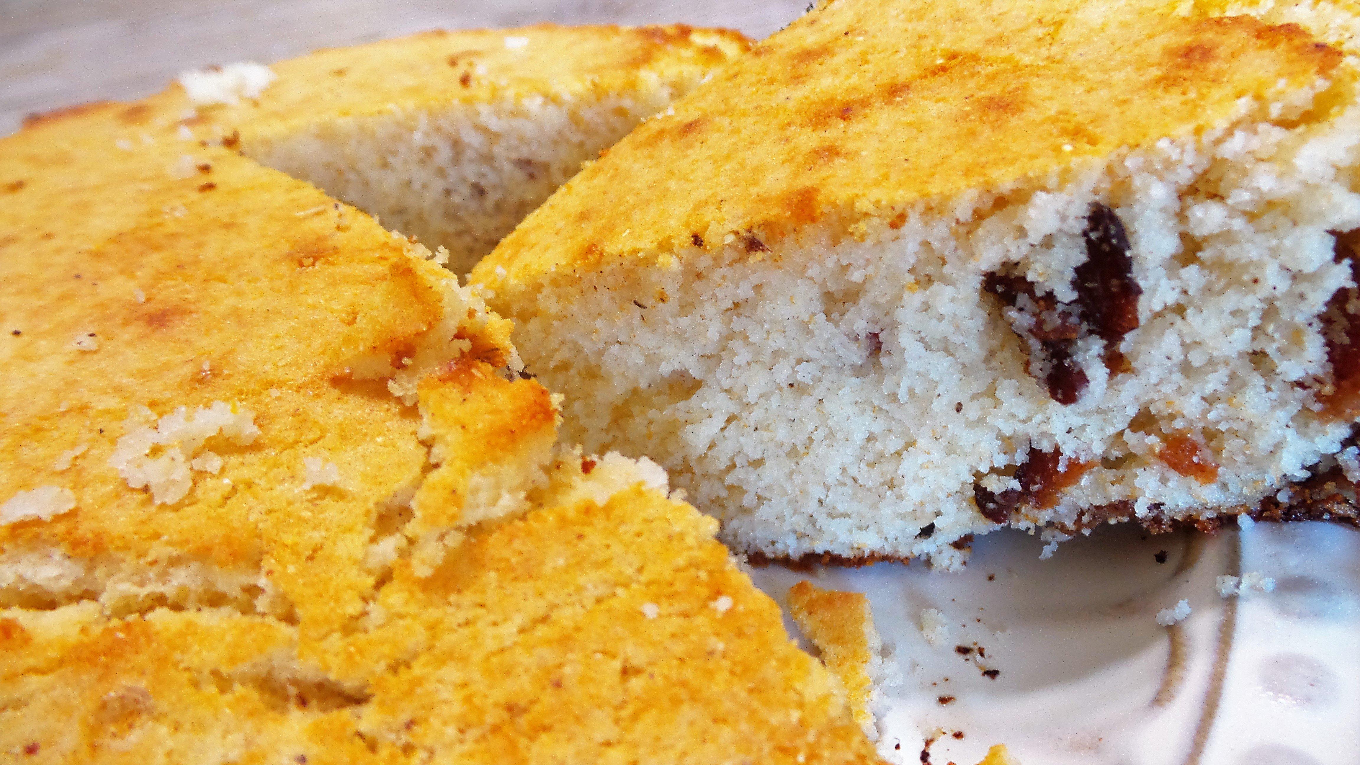 Add the crisp bacon to the cornbread batter.