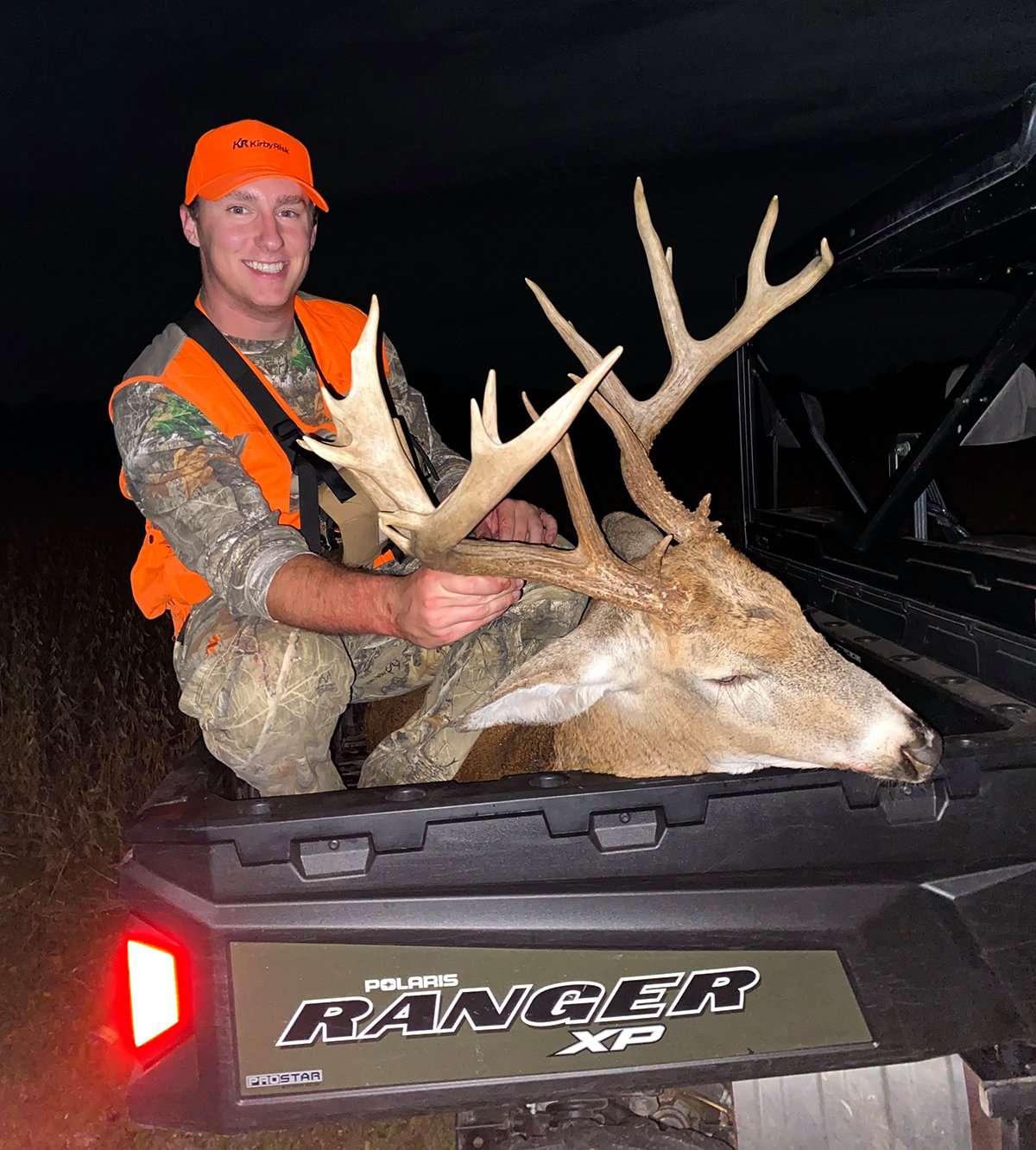 Nothing like having a monster buck in the bed of your UTV. Image by Alex Wieging