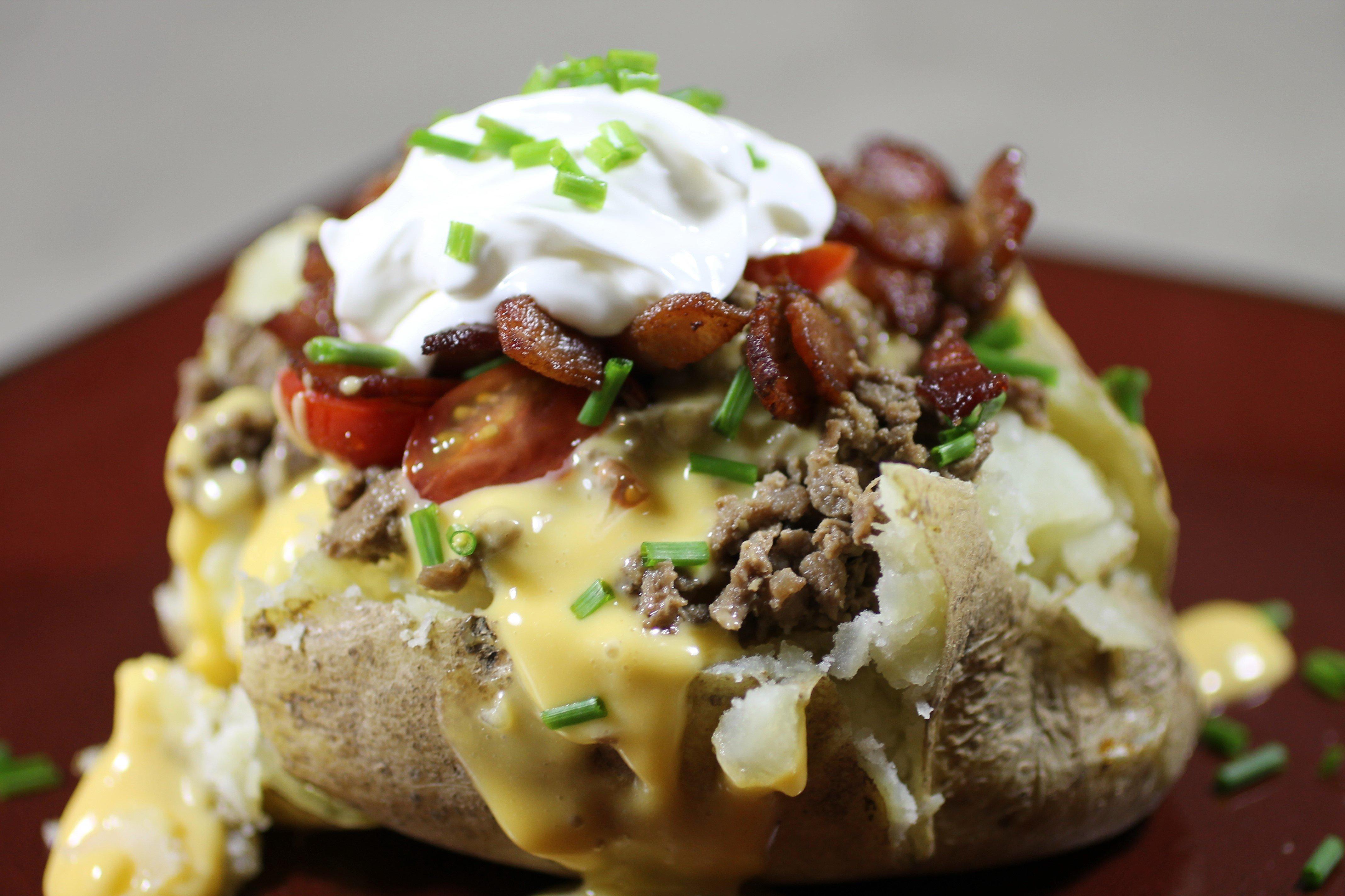 Ground venison, cheese sauce, bacon, and sour cream make up the All-American.