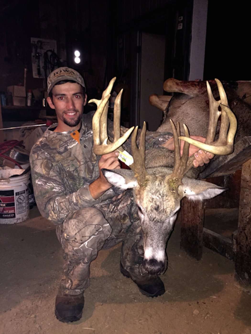 Dylan Flogel poses with his giant Iowa buck. (Dylan Flogel photo) Dylan Flogel poses with his giant Iowa buck. (Dylan Flogel photo)