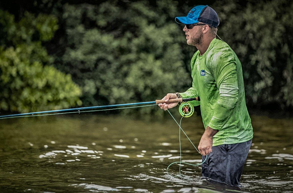 The Banded Realtree Fishing Trucker Hat and Performance Adventure Shirt