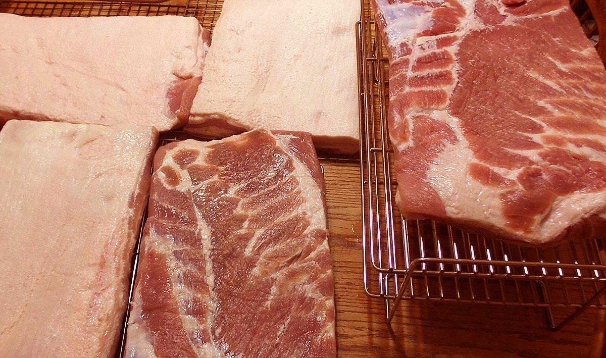 After the meat has cured, dry it overnight on wire racks to form a pellicle.