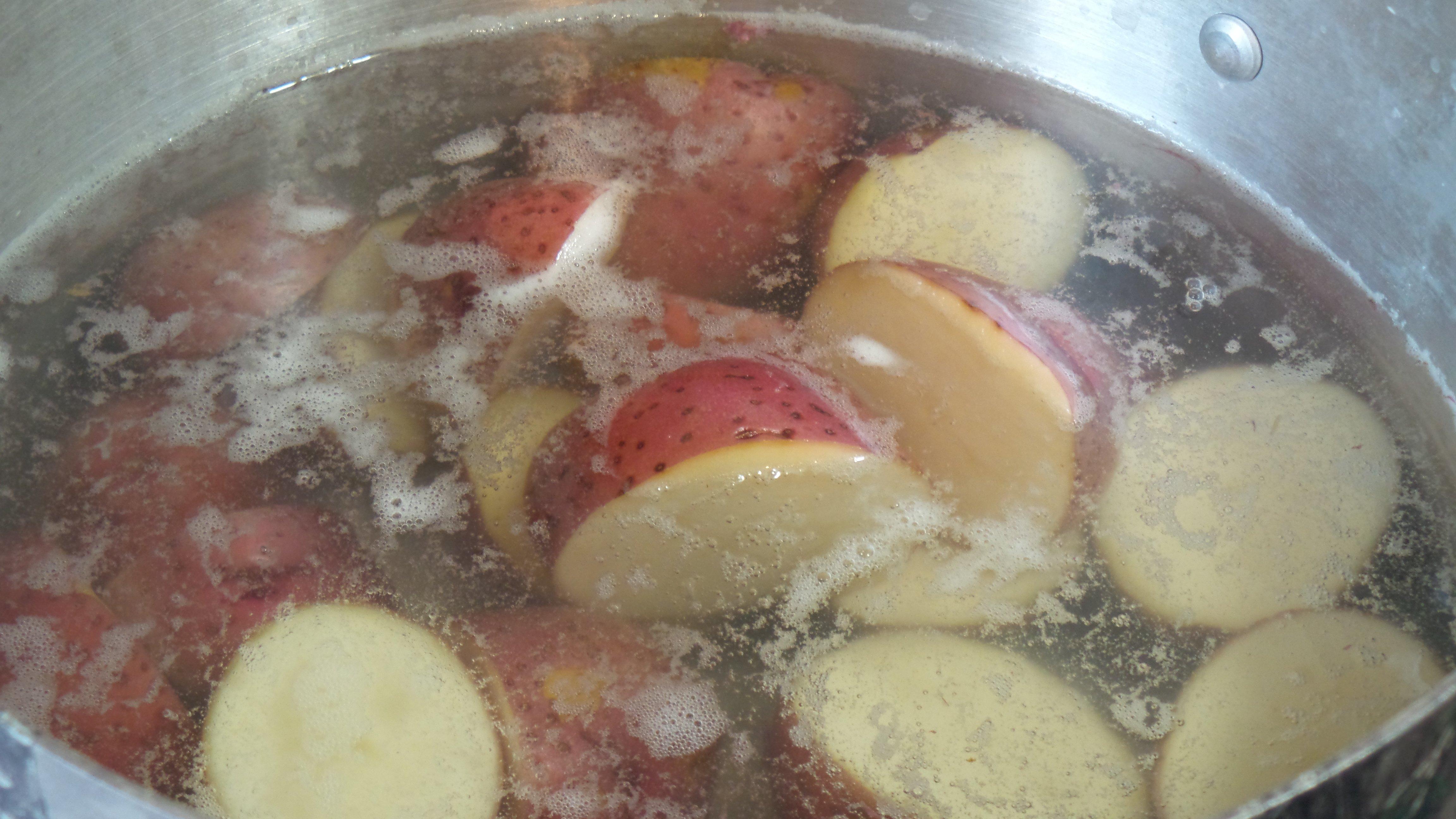 Boil the skin on potatoes until soft.