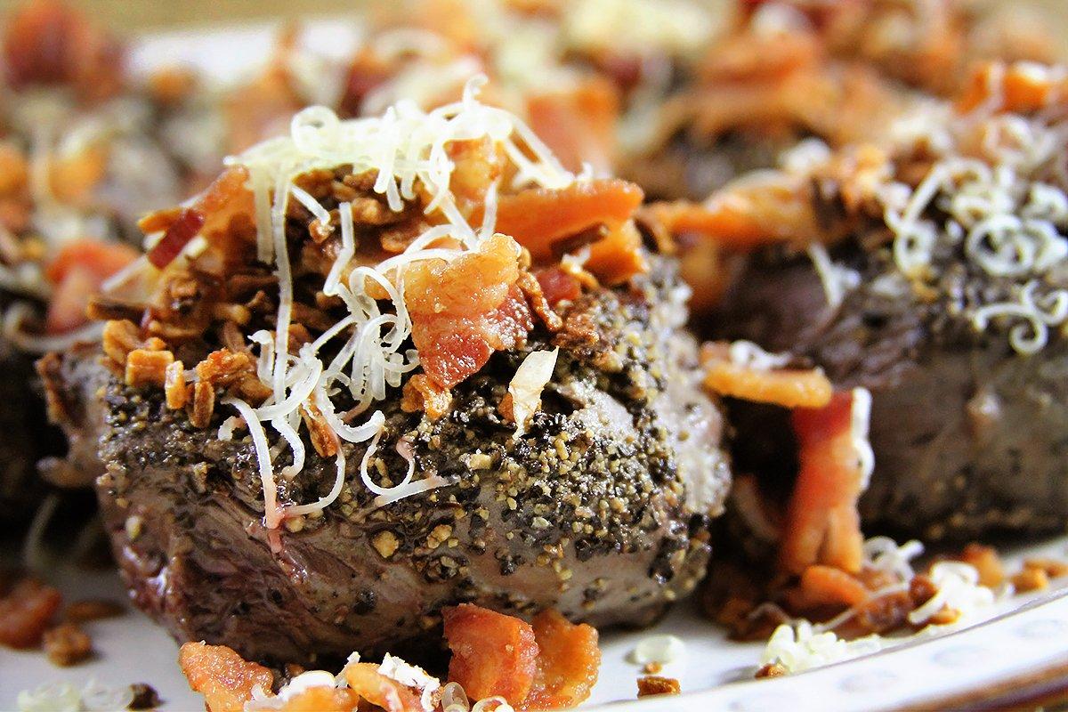 Peppercorn crusted, grilled backstrap medallions topped with bacon,crispy onion, and Parmesan cheese. What dad could say no?