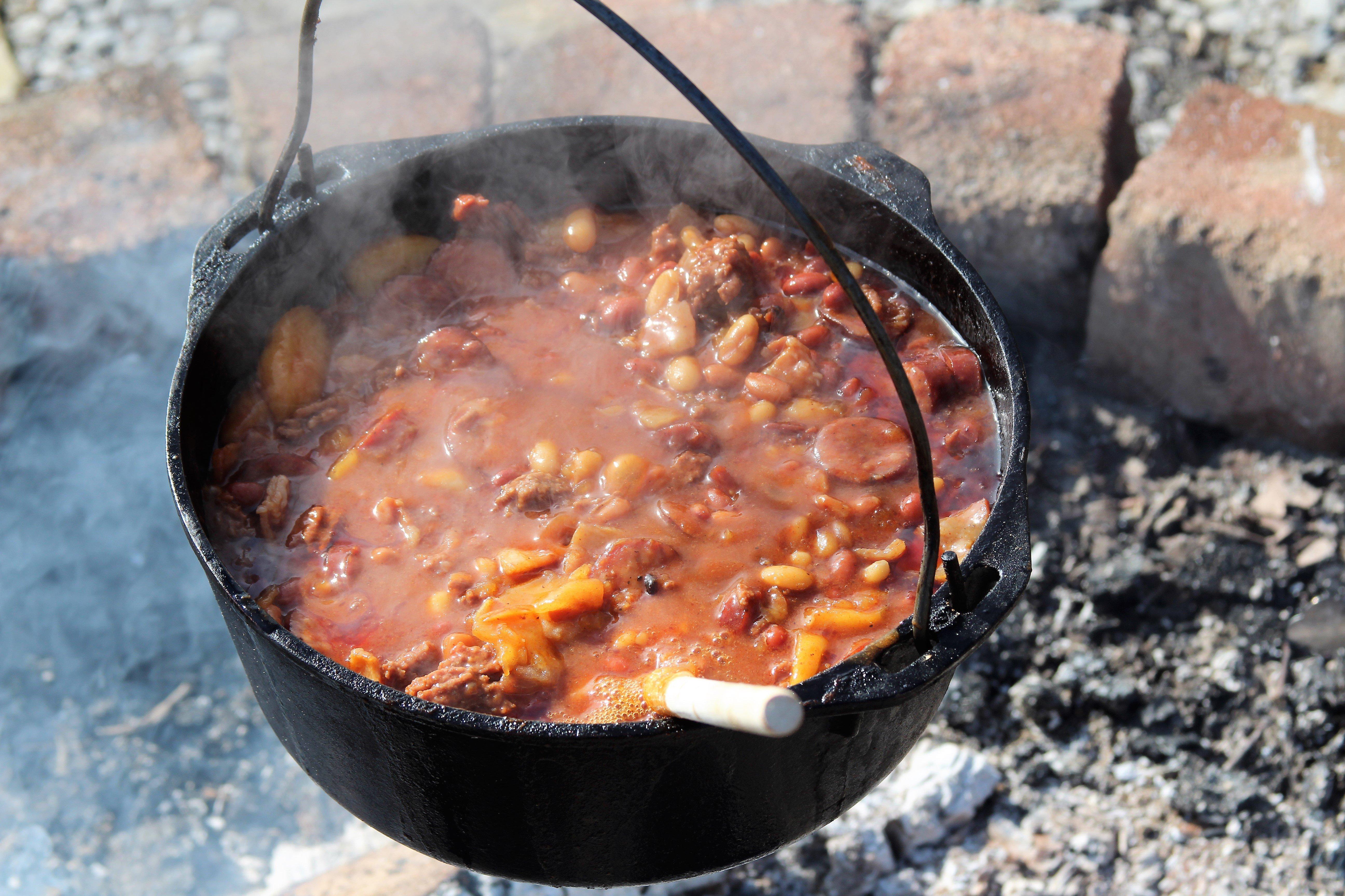 A Dutch oven is the perfect way to cook a large meal over a campfire.