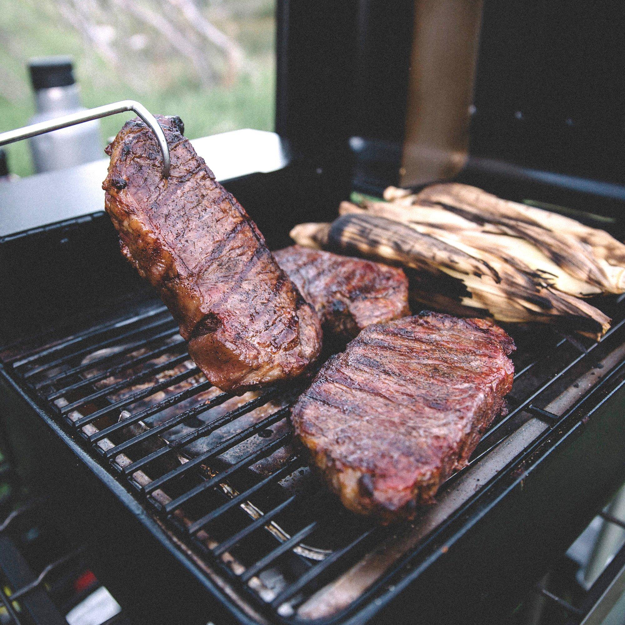 Pack along a grill to make meal prep simple. Photo Traeger Grills