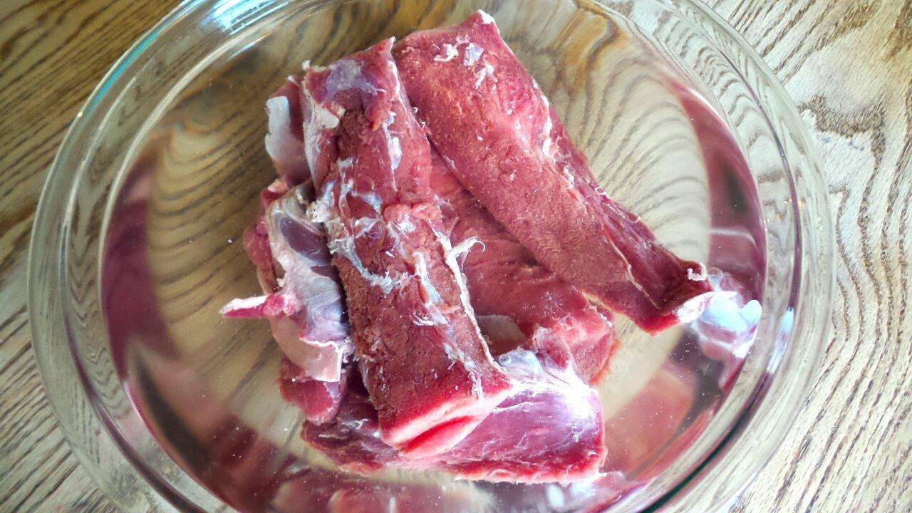 Soak the cured loin in cold water.