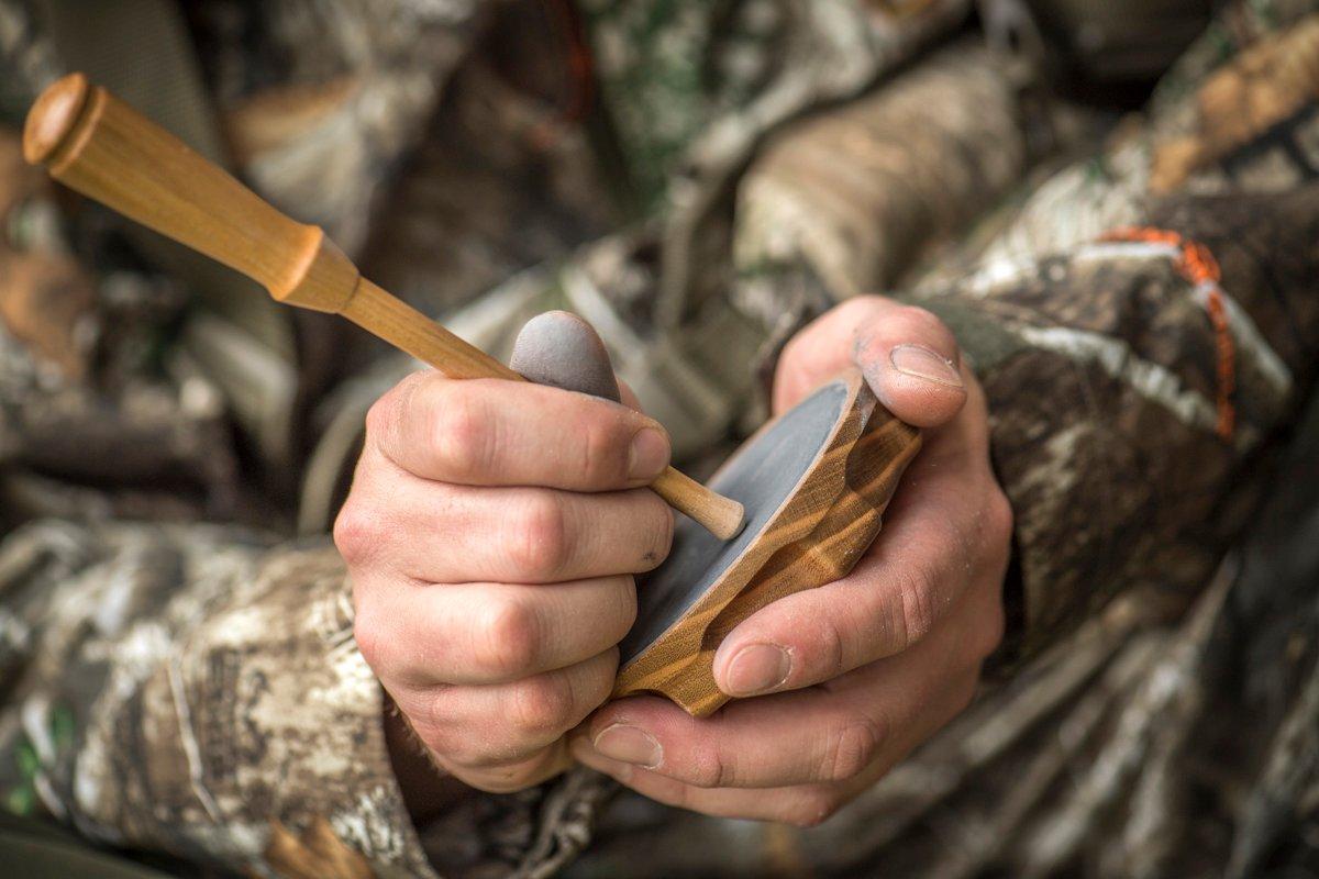 Fighting purrs can pull gobblers into range. © Bill Konway photo